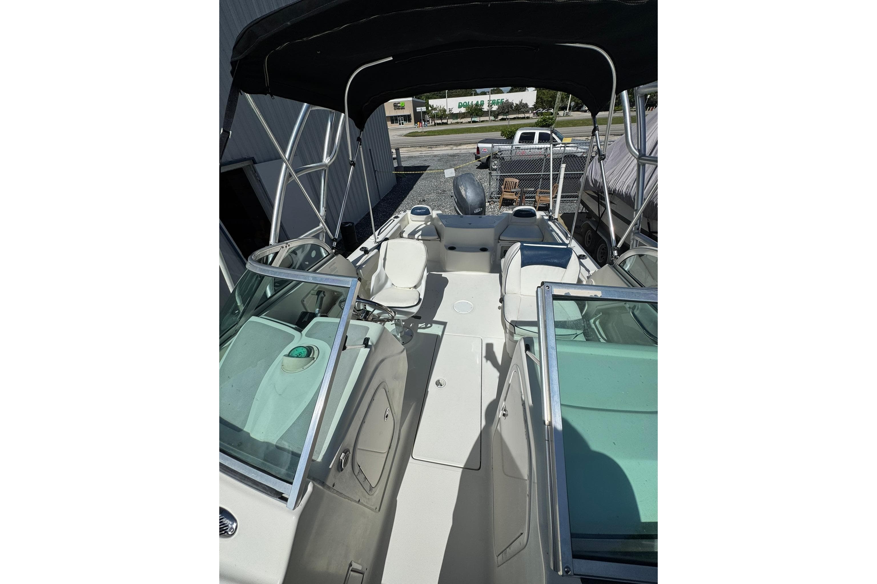 2004 Hydra-Sports Lightning 202 DC boat interior with seating and canopy.