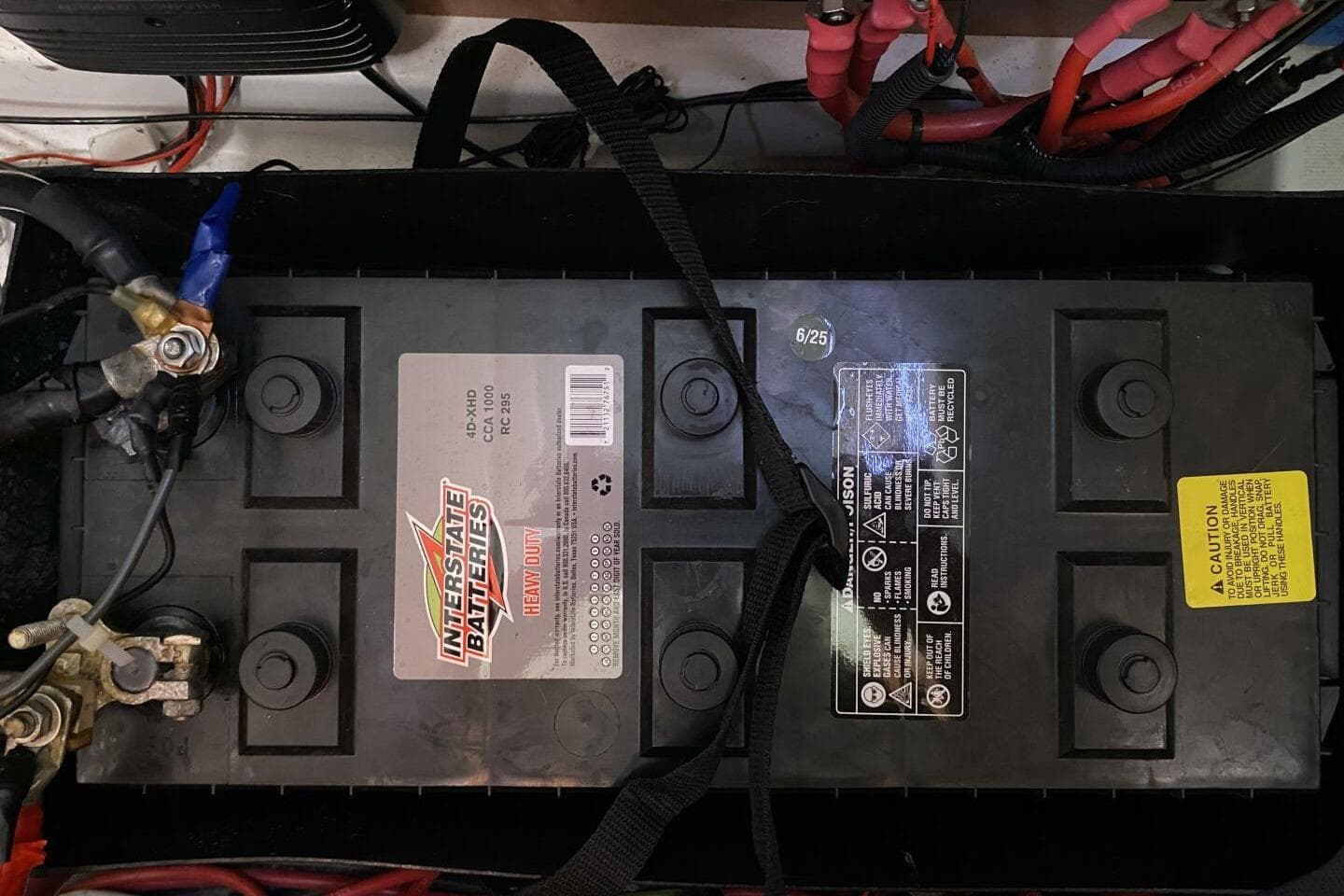 Battery setup in a 2009 Beneteau 43 sailboat, featuring Interstate Batteries.