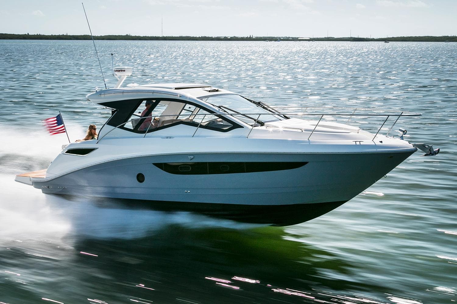 Manufacturer Provided Image: 2018 Sea Ray Sundancer 350 Coupe cruising on open water.