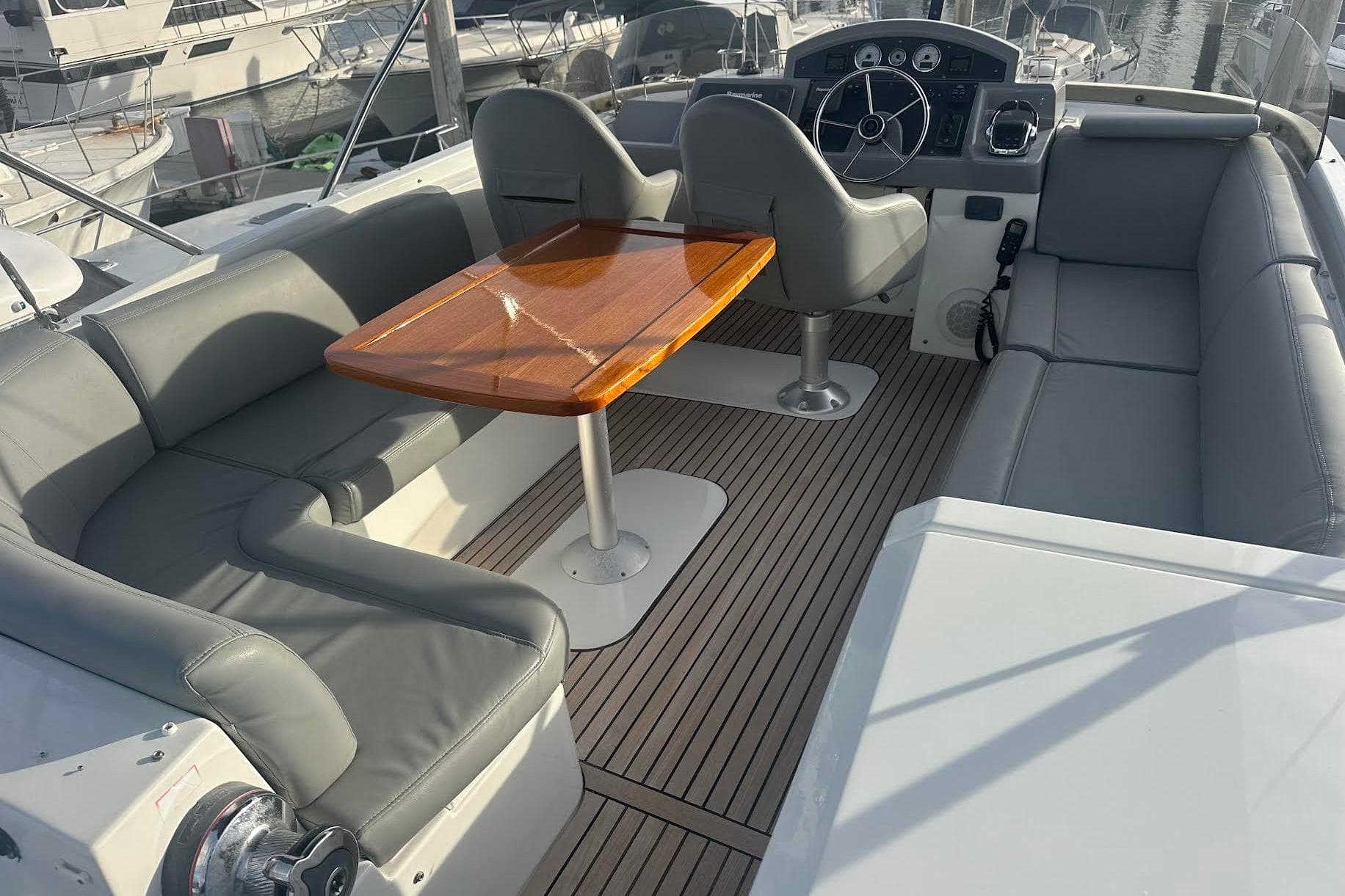 Flybridge of 2015 Beneteau Swift Trawler 44 with seating and helm station.