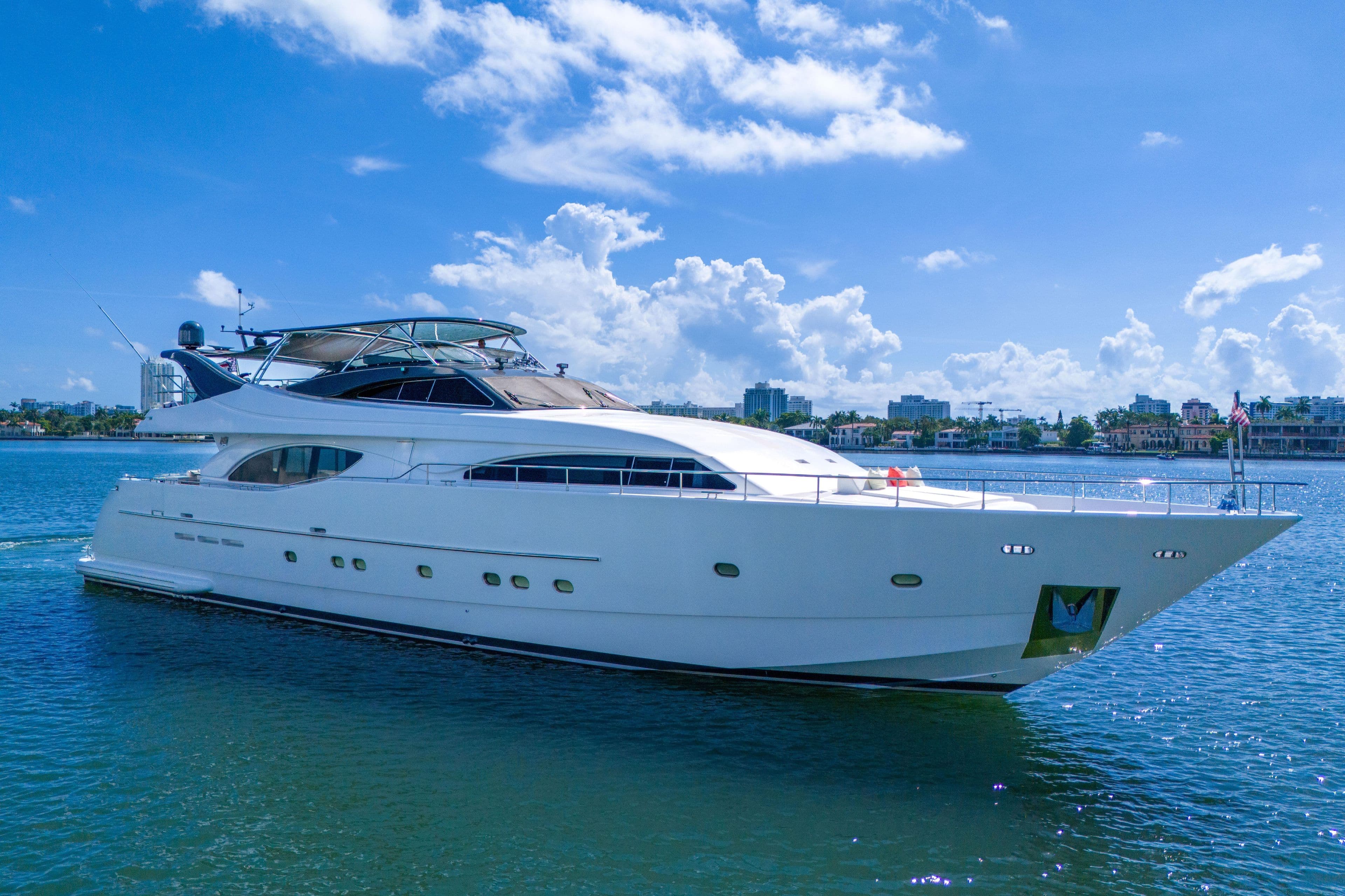 Ferretti Yachts Custom Line 94, 2002 model, cruising on a sunny day.