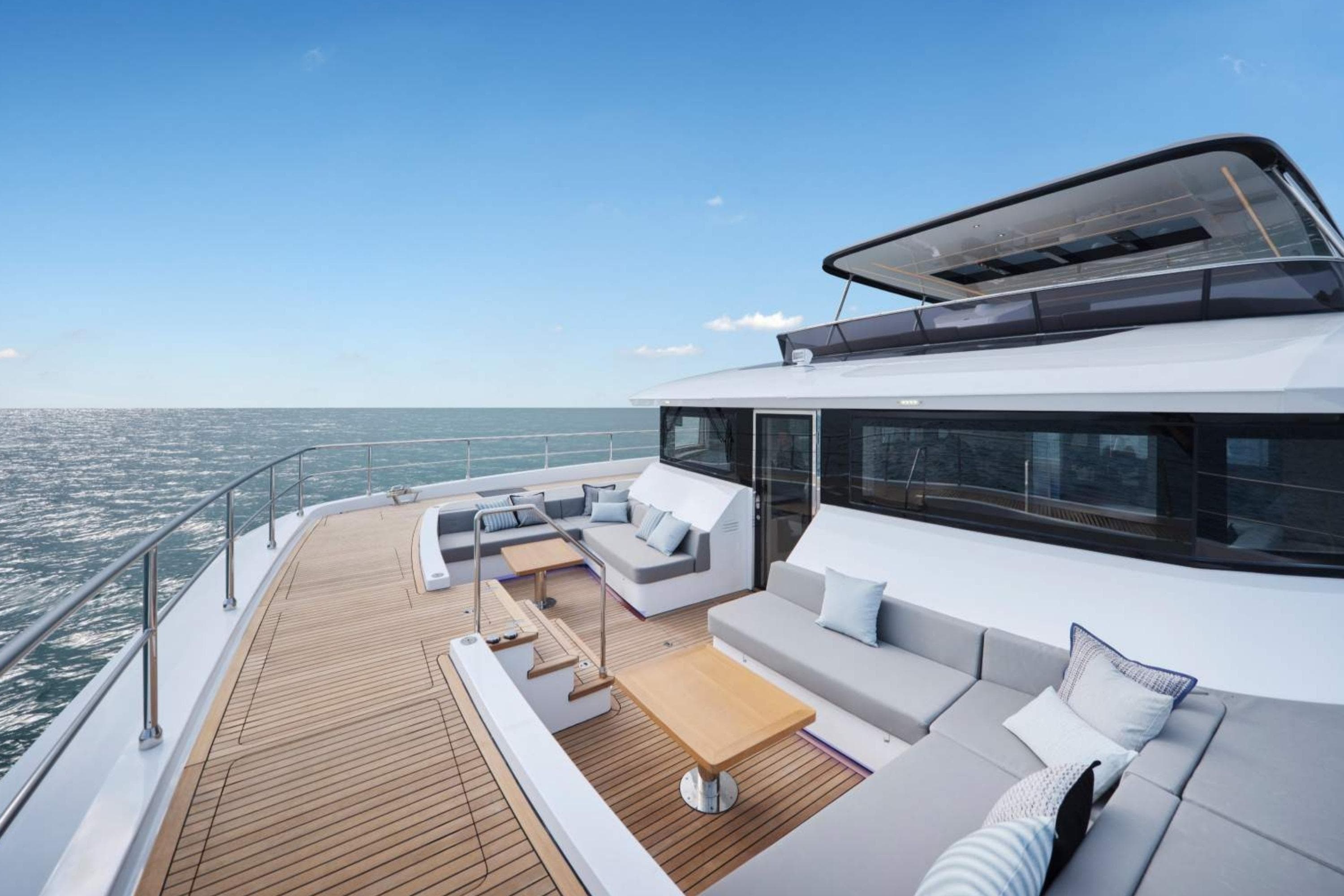 Luxurious 2026 Heysea V75 yacht deck with modern seating and ocean view.