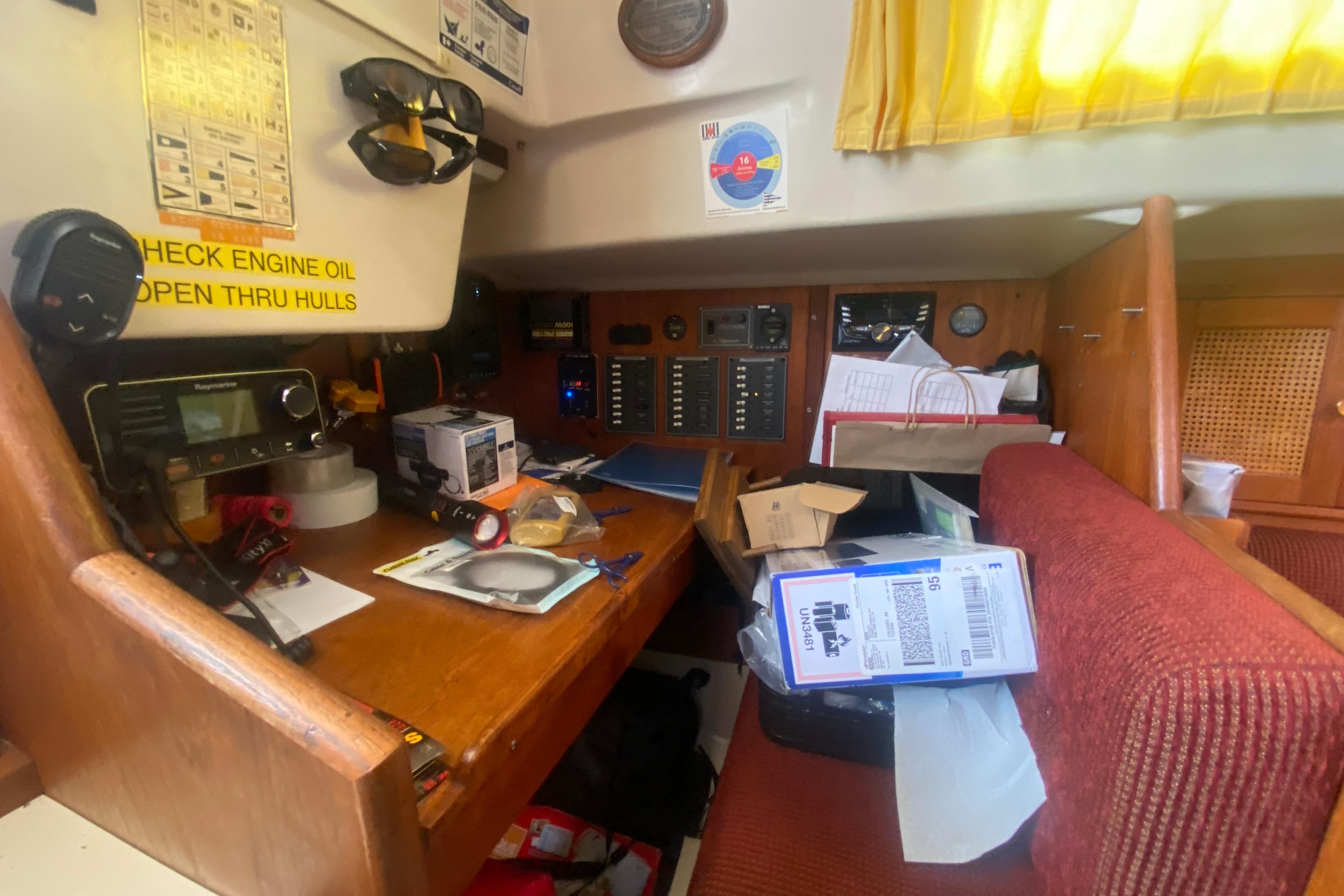 Interior of a 1978 Ontario Yachts Ontario 32 sailboat with navigation equipment and storage.