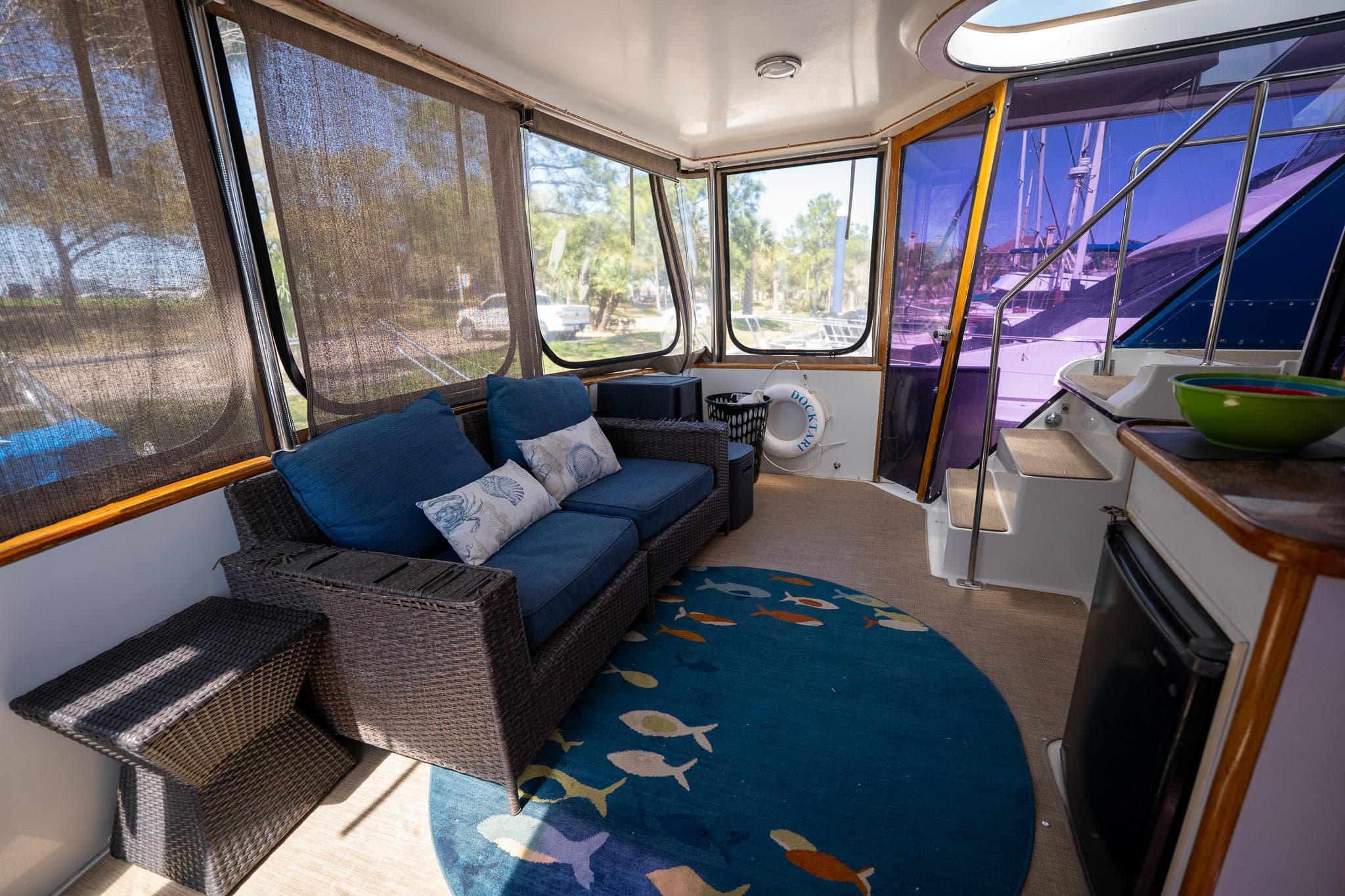 1988 Carver 42 Aft Cabin Motoryacht interior with cozy seating and nautical decor.
