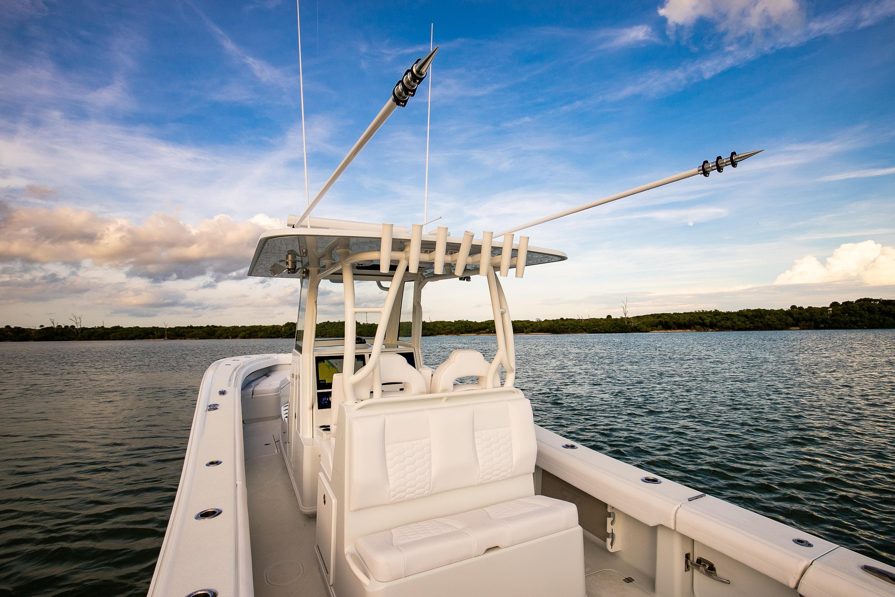2026 Yellowfin 36 Offshore boat on calm water under a blue sky.