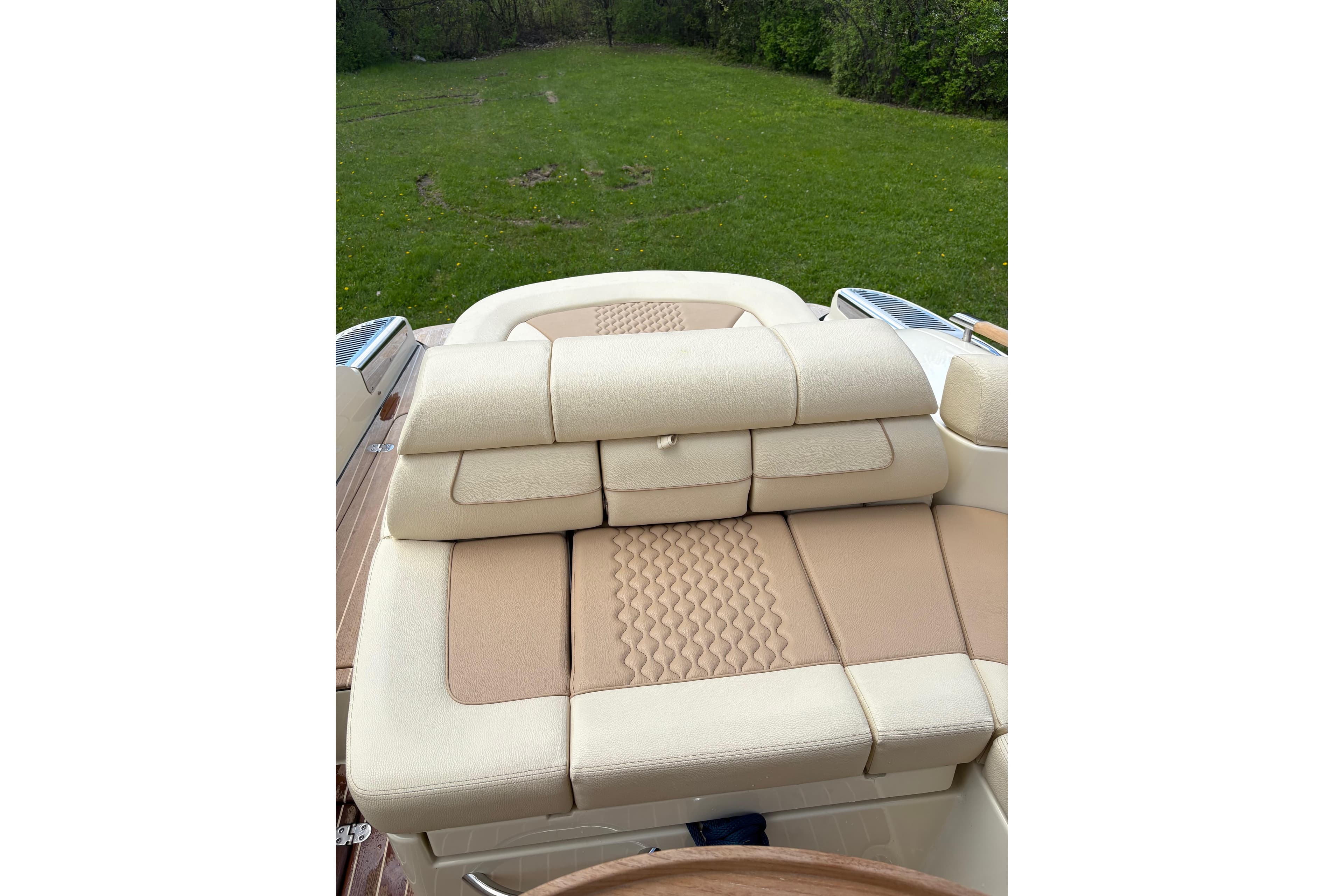 2022 Chris-Craft Launch 28 GT boat with luxurious beige seating.