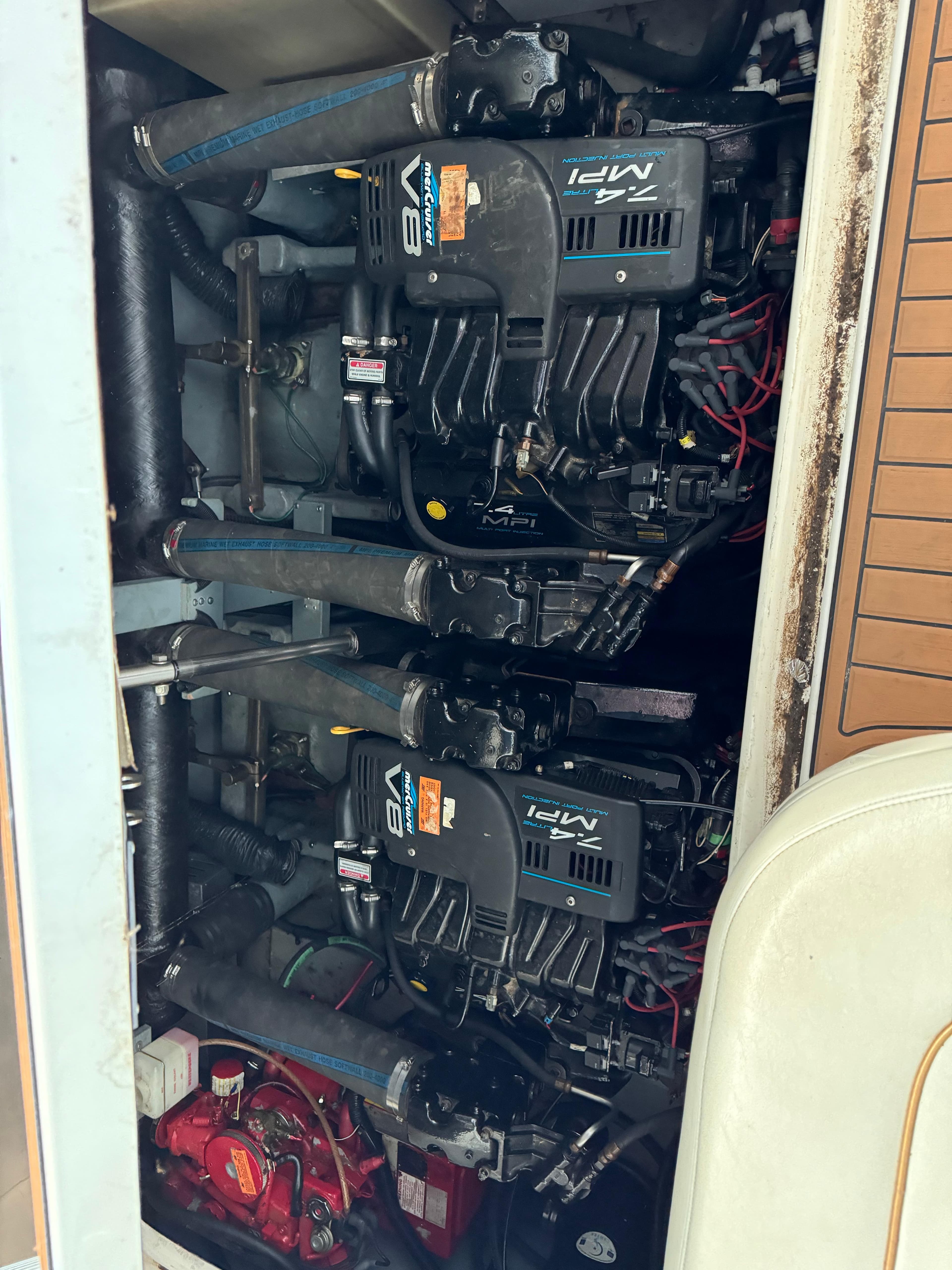 1998 Sea Ray 330 Sundancer engine compartment with twin V8 engines.