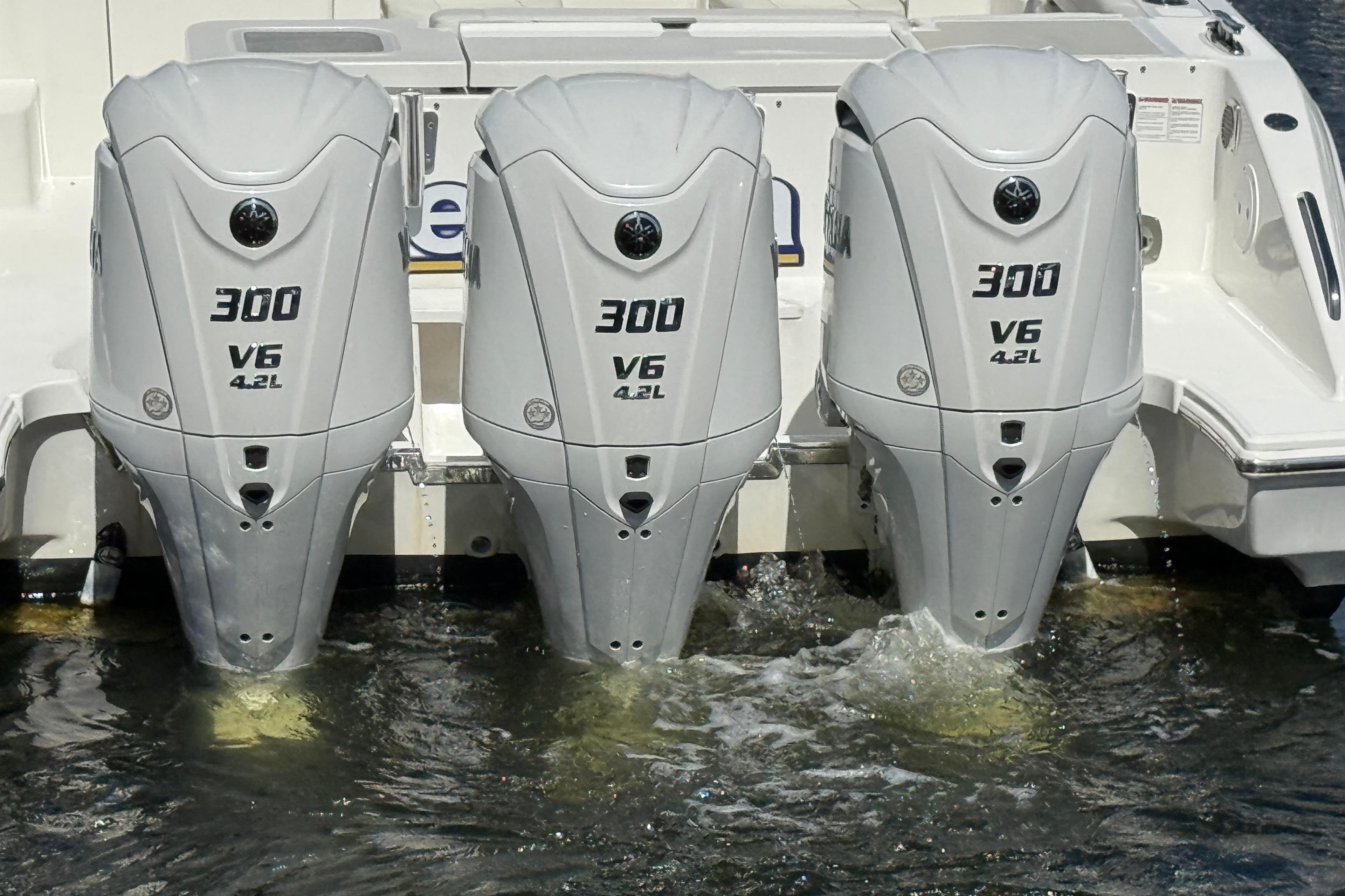 Triple Yamaha 300 V6 outboard engines on a 2023 Pursuit OS 355 Offshore boat.