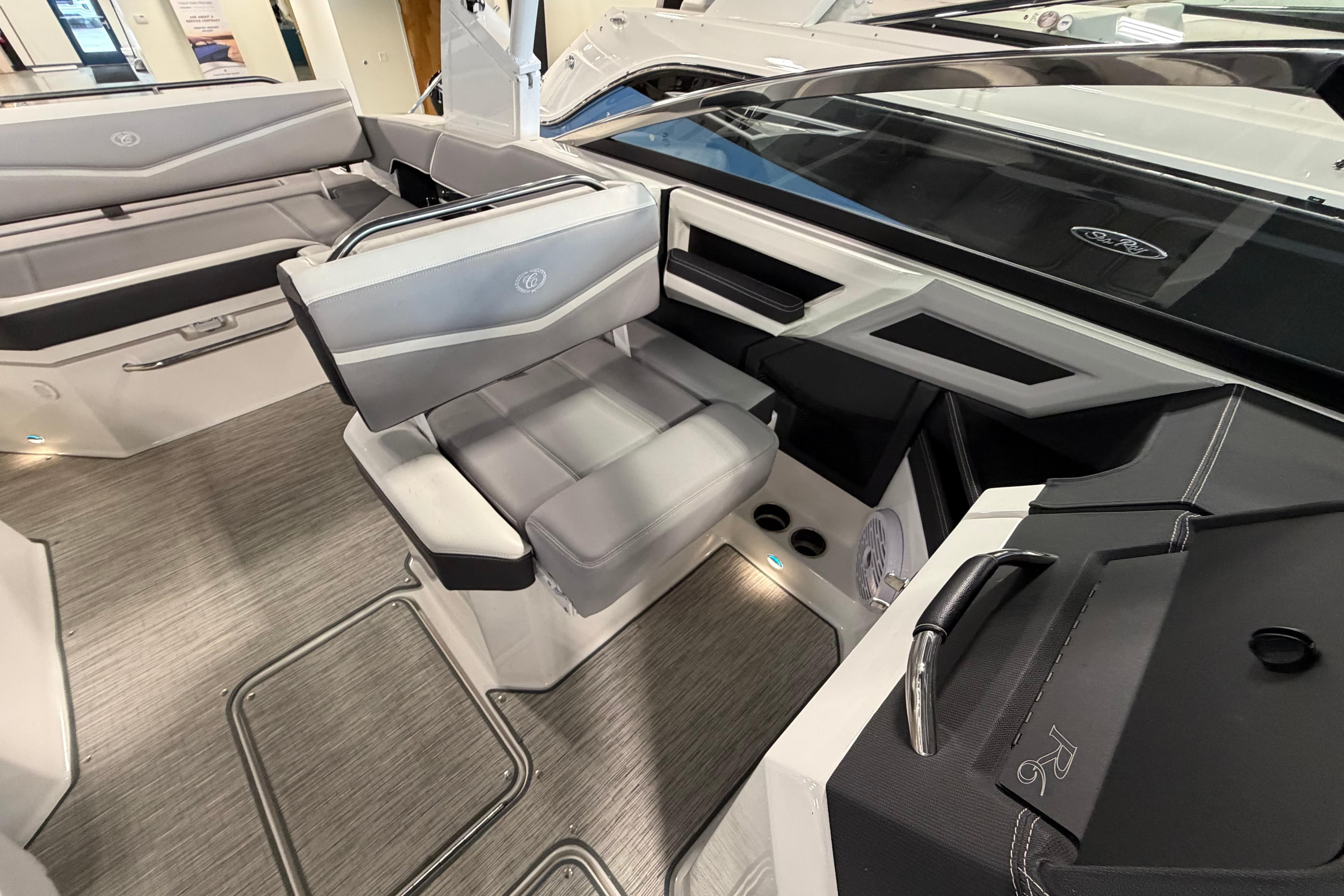 Interior of a 2022 Cobalt R6 Surf boat, featuring sleek seating and modern design.