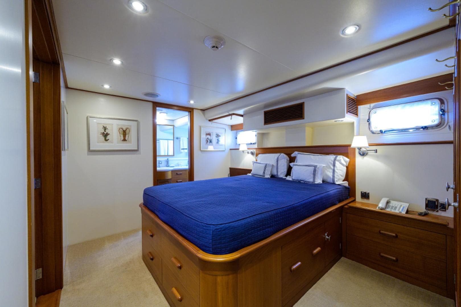 Luxurious bedroom in 2003 New England Boatworks Enclosed Raised Pilothouse yacht.