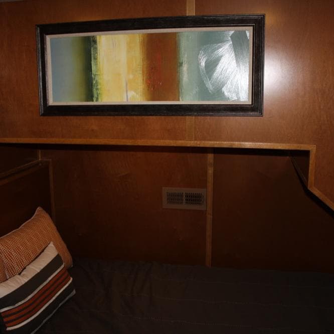 Framed abstract painting in a 2015 Bravada Evolution Share #7 interior.