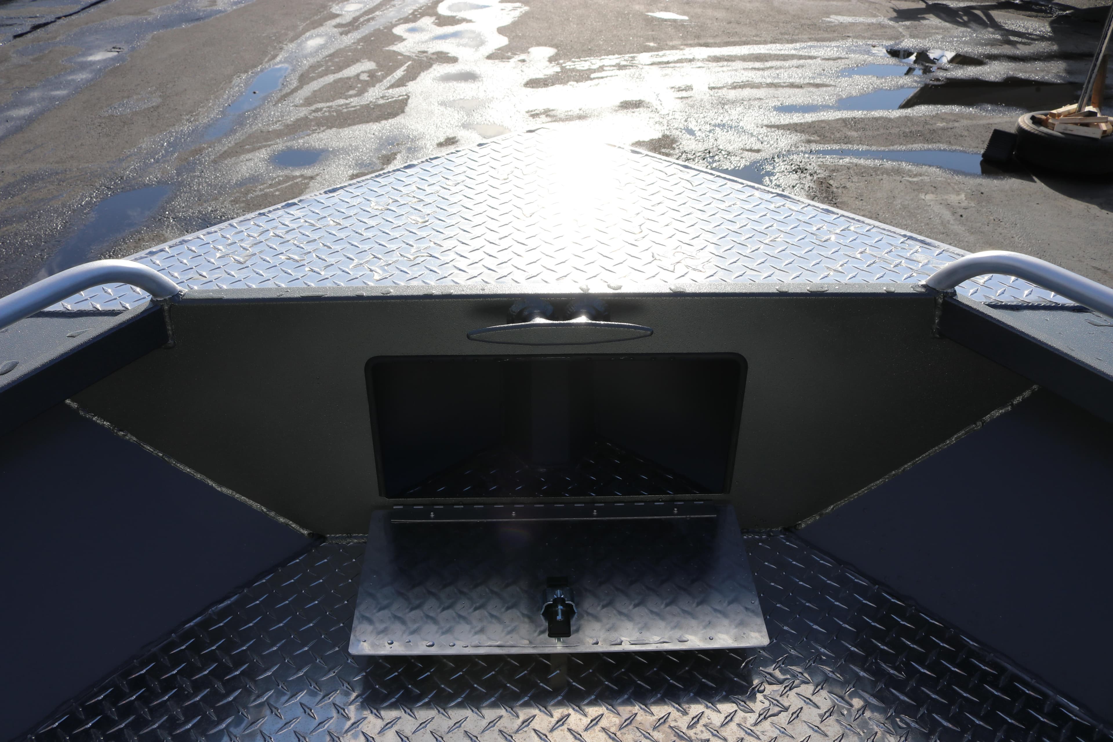 2026 Alumaweld Intruder Hard Top 24 boat deck with diamond plate flooring.