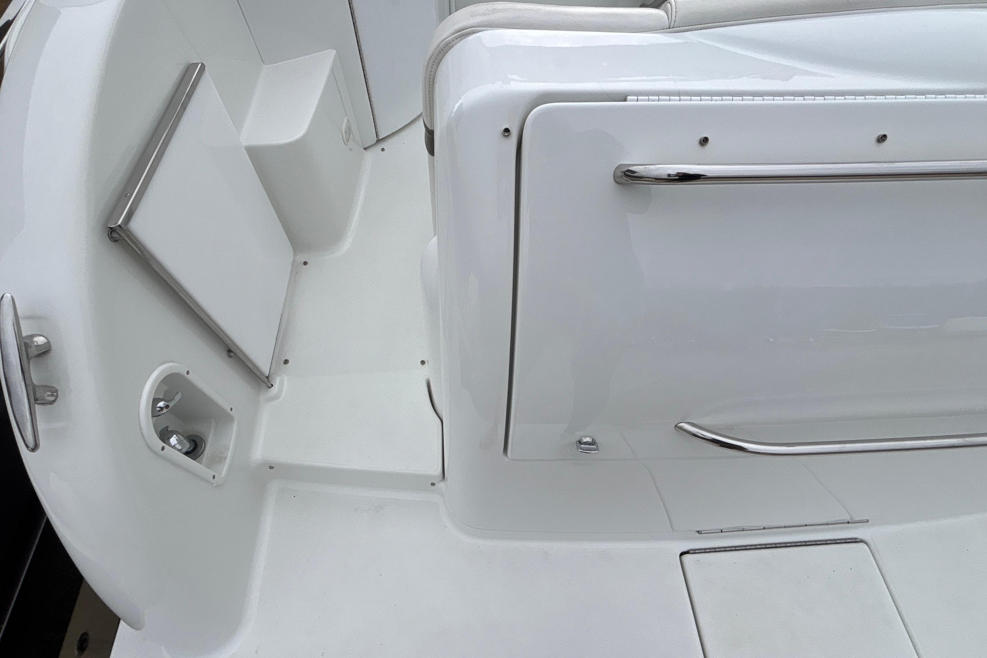 2005 Formula 31 Performance Cruiser interior with white seating and chrome accents.