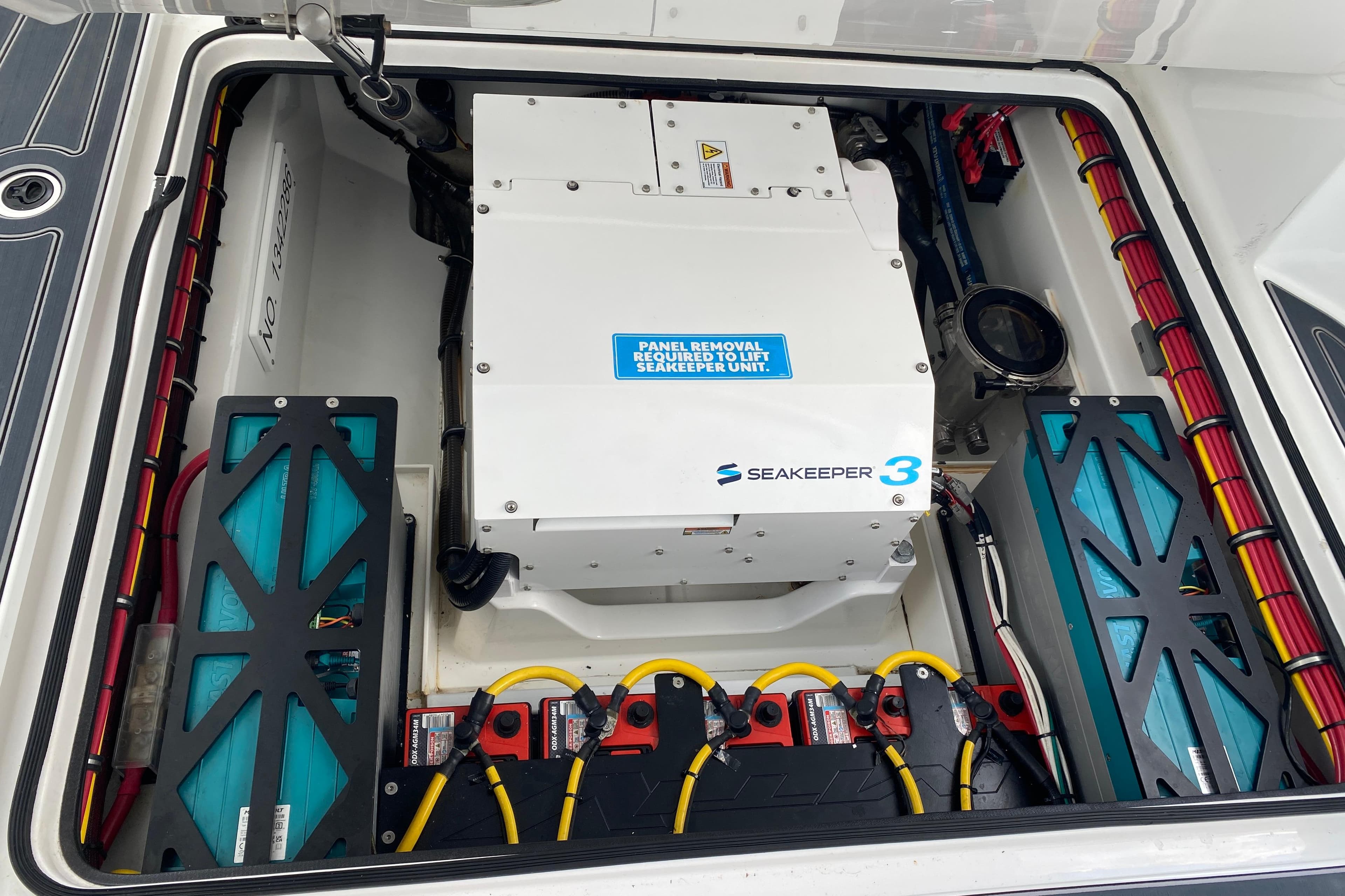Engine compartment of 2024 MTI V50 featuring Seakeeper 3 stabilization system.