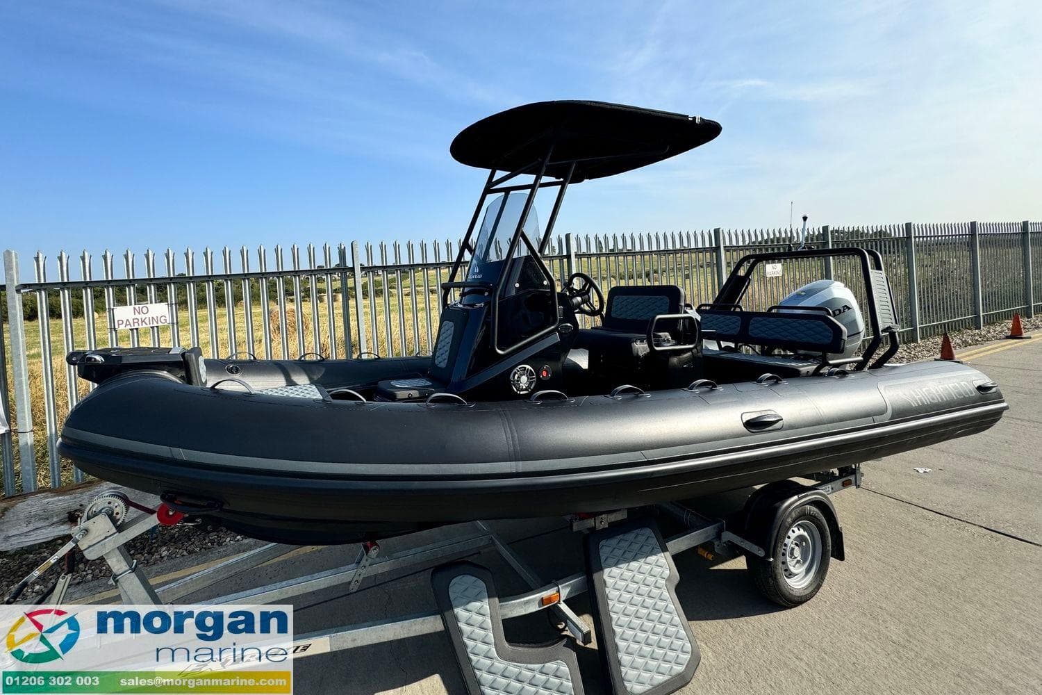 2023 Highfield Sport 560 boat on trailer at Morgan Marine dealership.