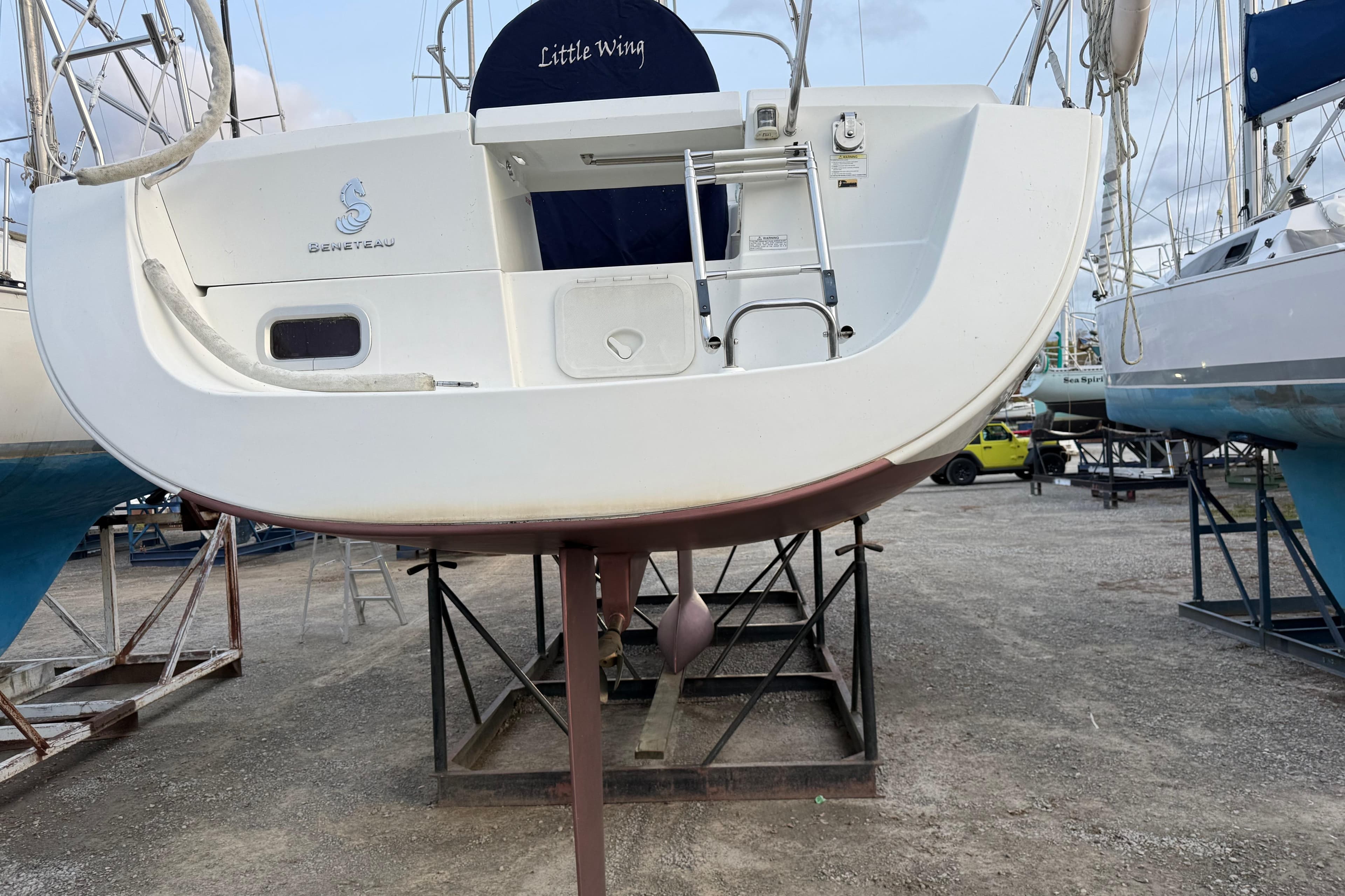2008 Beneteau 31 sailboat "Little Wing" on dry dock, rear view.