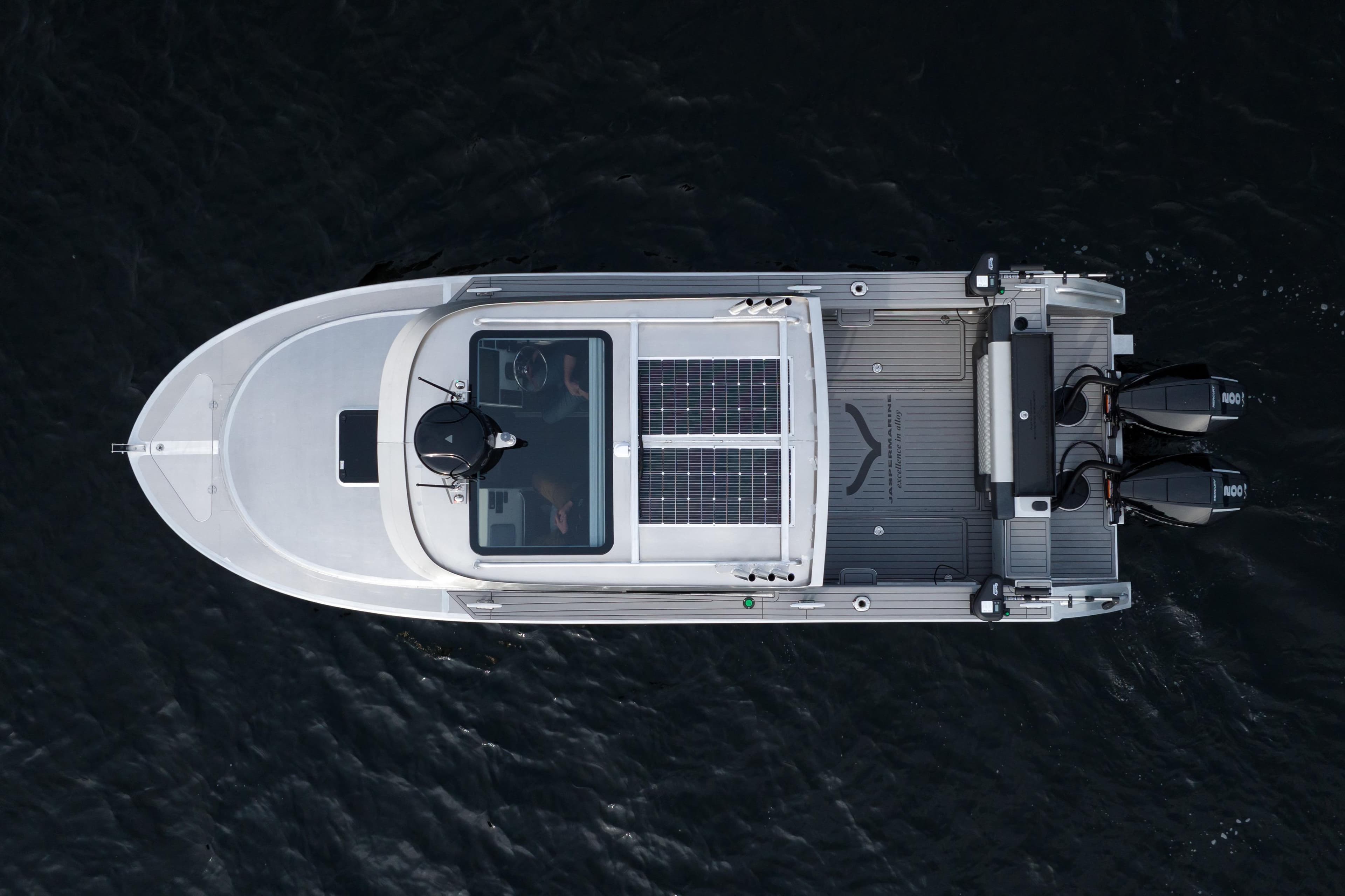 Overhead view of 2026 Jasper Marine Defender 22 boat with solar panels and dual engines.