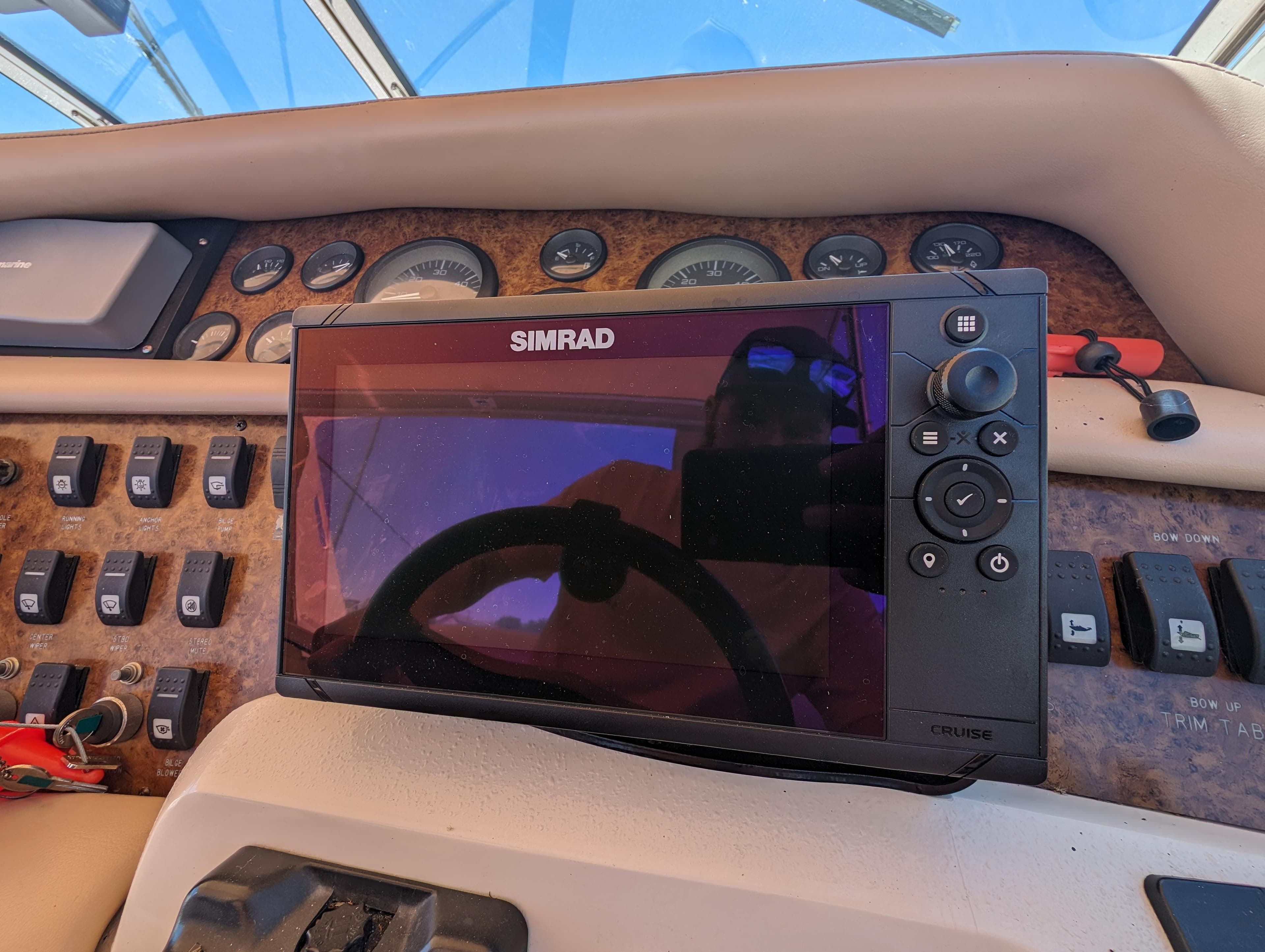 Simrad navigation system on 1995 Sea Ray 380 Sun Sport boat dashboard.