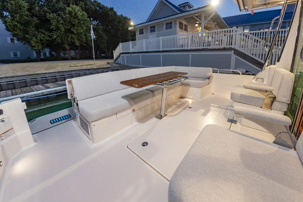 2026 Sabre 43 Salon Express yacht with spacious outdoor seating and elegant design.