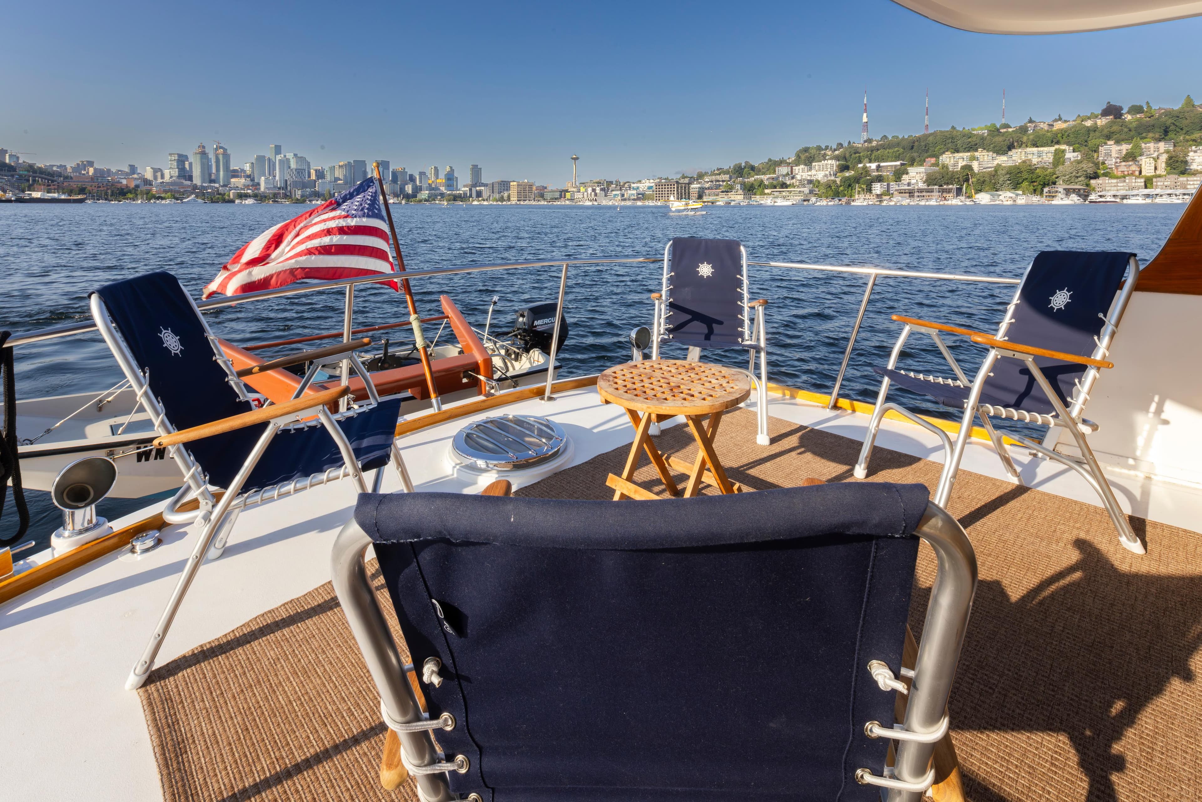Deck of a 1965 Stephens Flushdeck with city view.