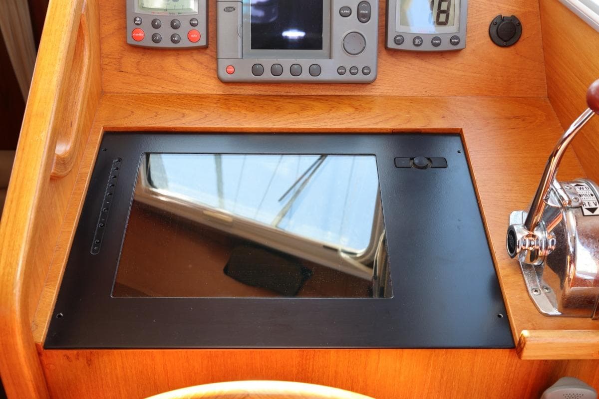 Control panel of a 2002 Nauticat 331 sailboat with navigation instruments.