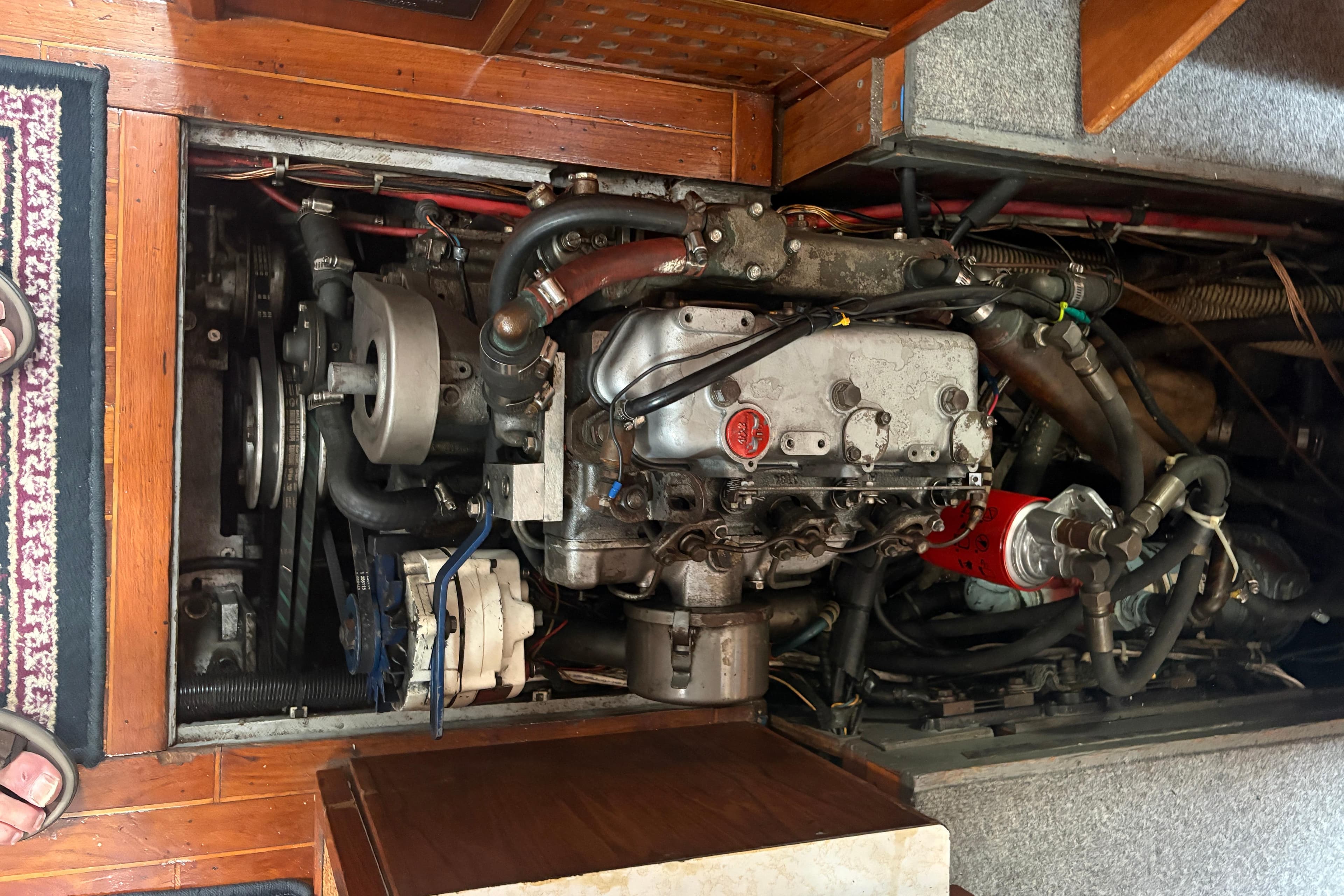 Engine compartment of a 1977 Folkes Full Keel Offshore Cutter sailboat.