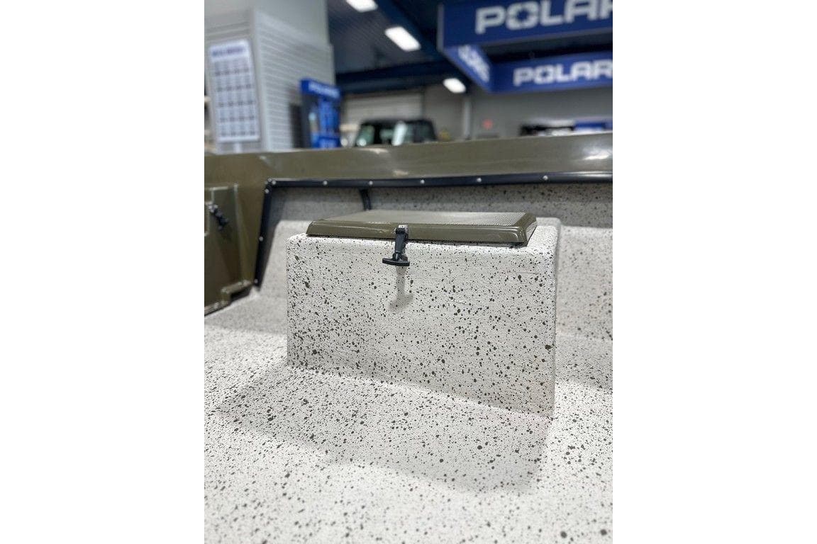 2026 Mi Tide 1602 CC boat interior with speckled finish and storage compartment.