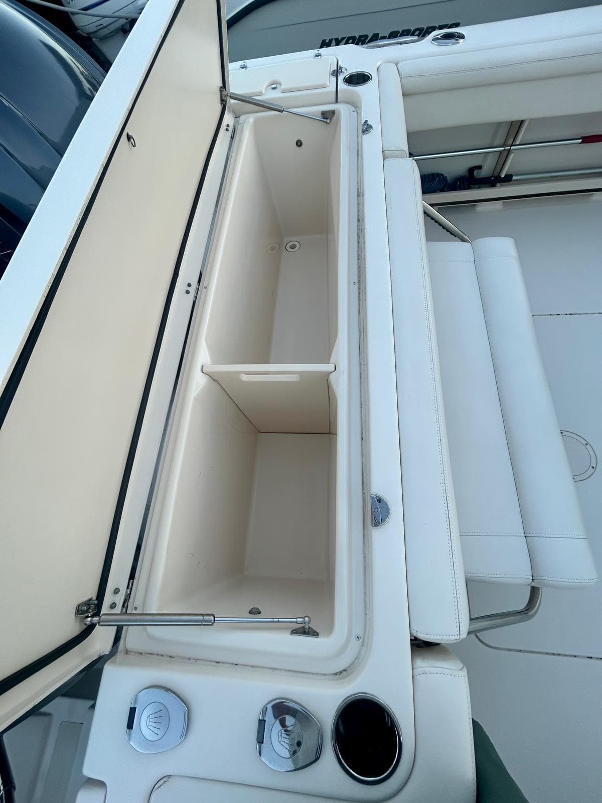 2021 Grady-White Express 330 boat storage compartment, open and empty, showcasing interior space.