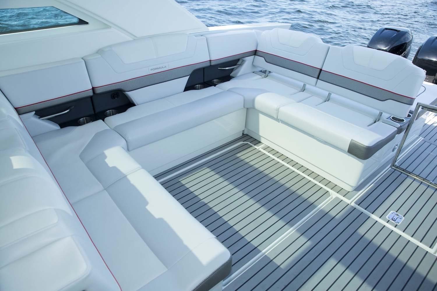 Manufacturer Provided Image: 2019 Formula 430 Super Sport Crossover boat interior with white seating and ocean view.