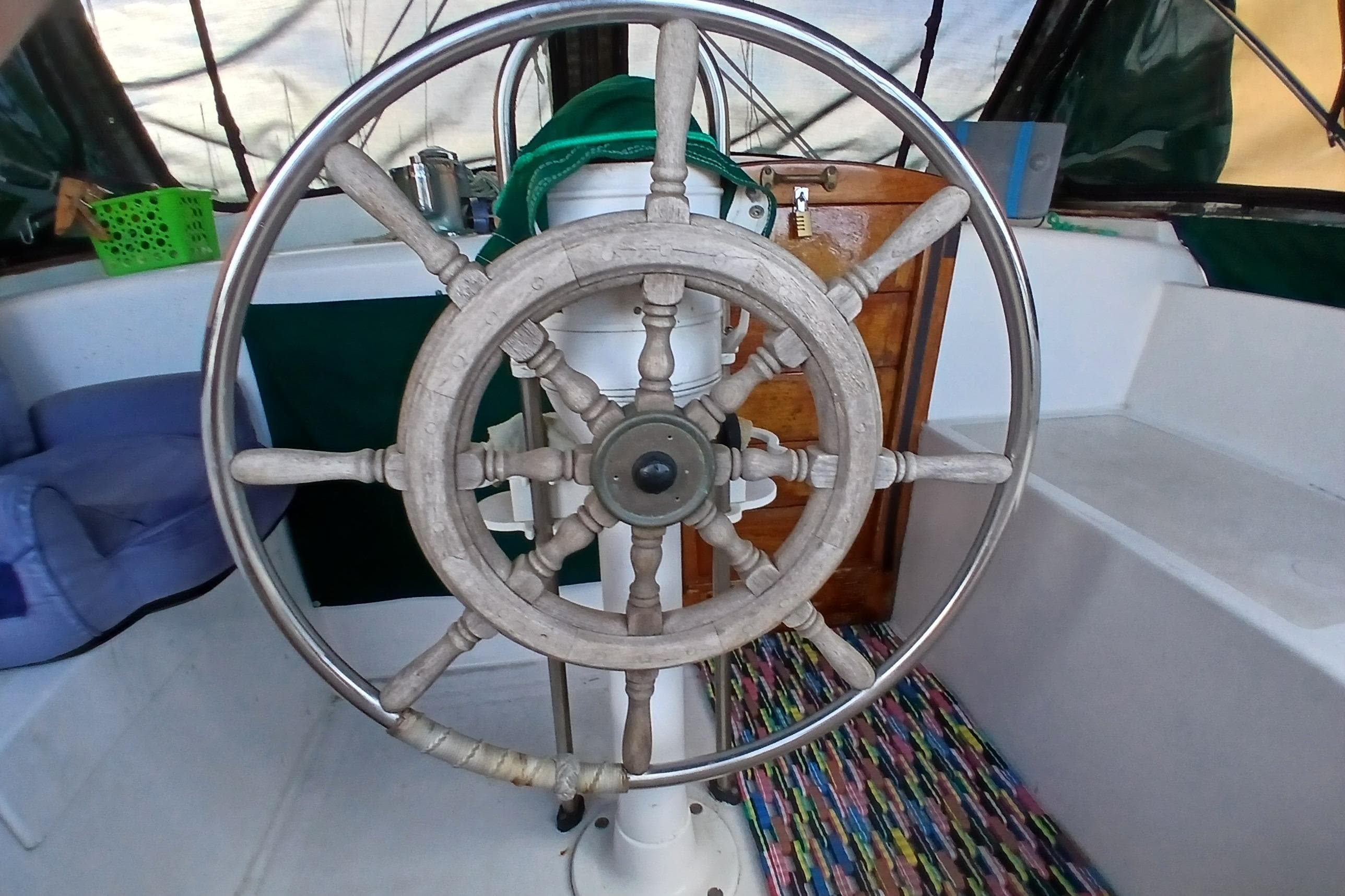 Wooden steering wheel on 1981 Wellington 44 Center Cockpit sailboat.