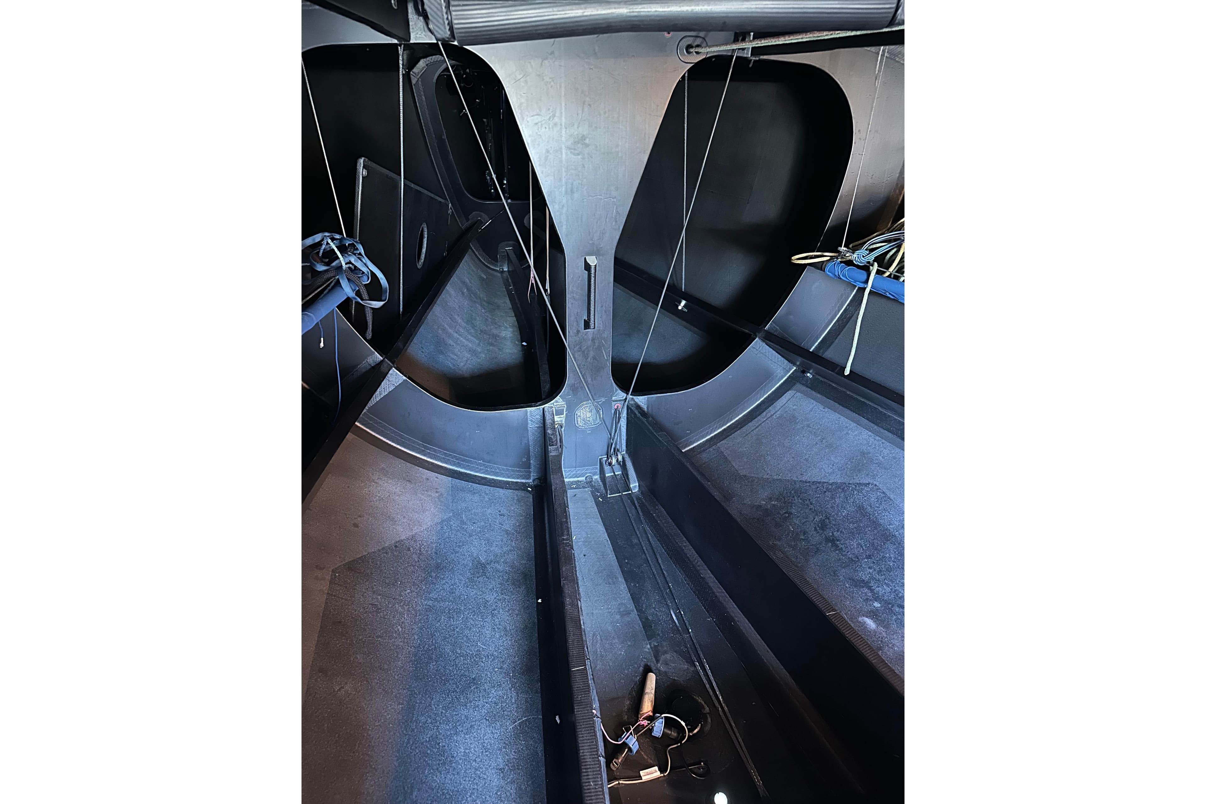 Interior view of a 2018 Botin 56 sailboat, showcasing sleek design and rigging details.