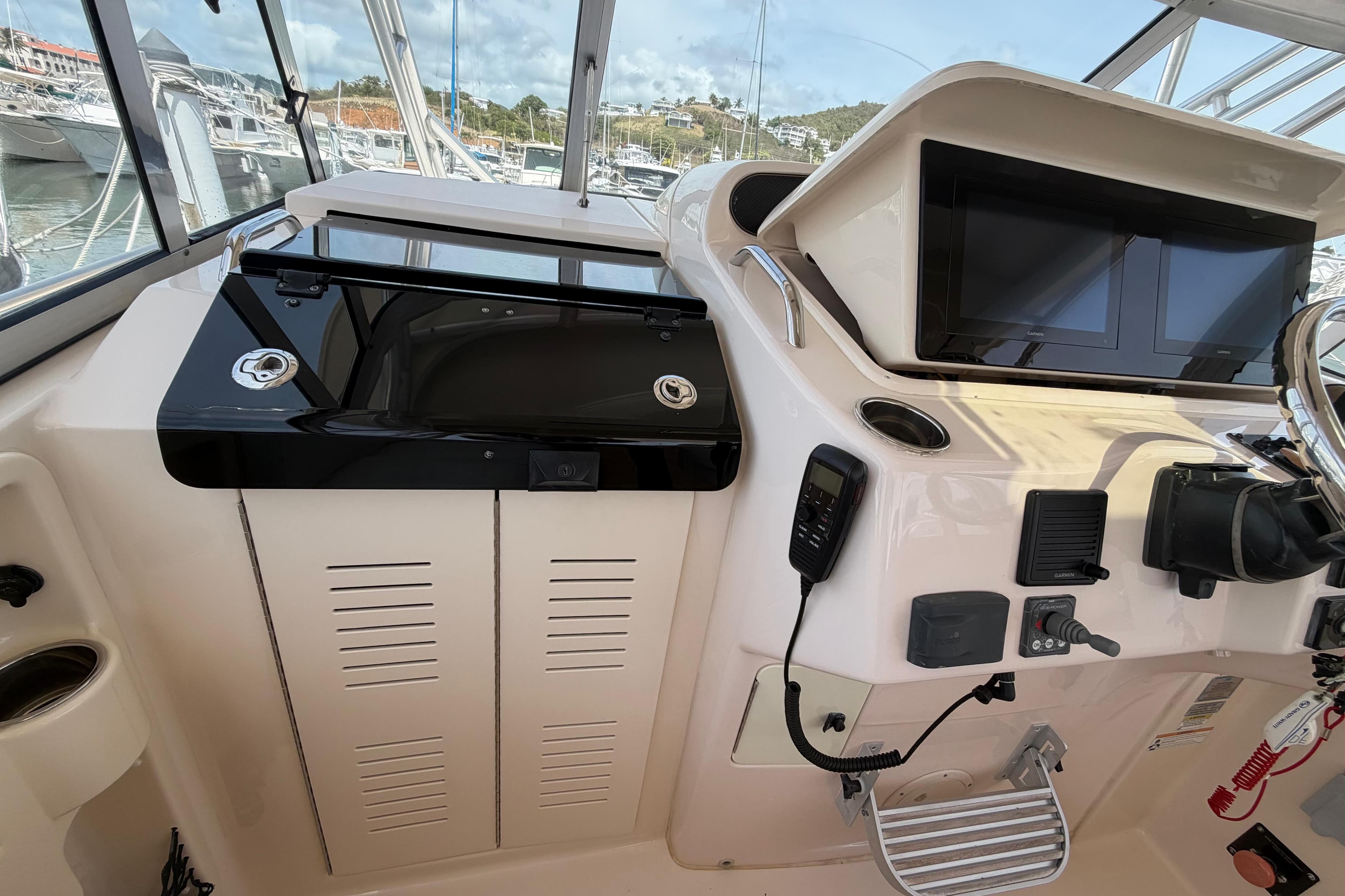 2014 Grady-White Express 330 helm with modern controls and navigation displays.