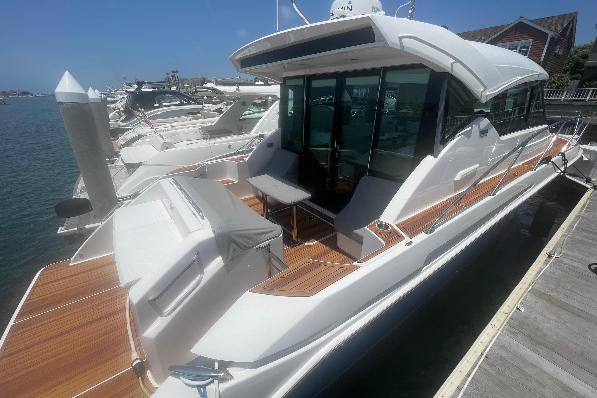 2020 Tiara Yachts C39 Coupe docked, showcasing sleek design and spacious deck.
