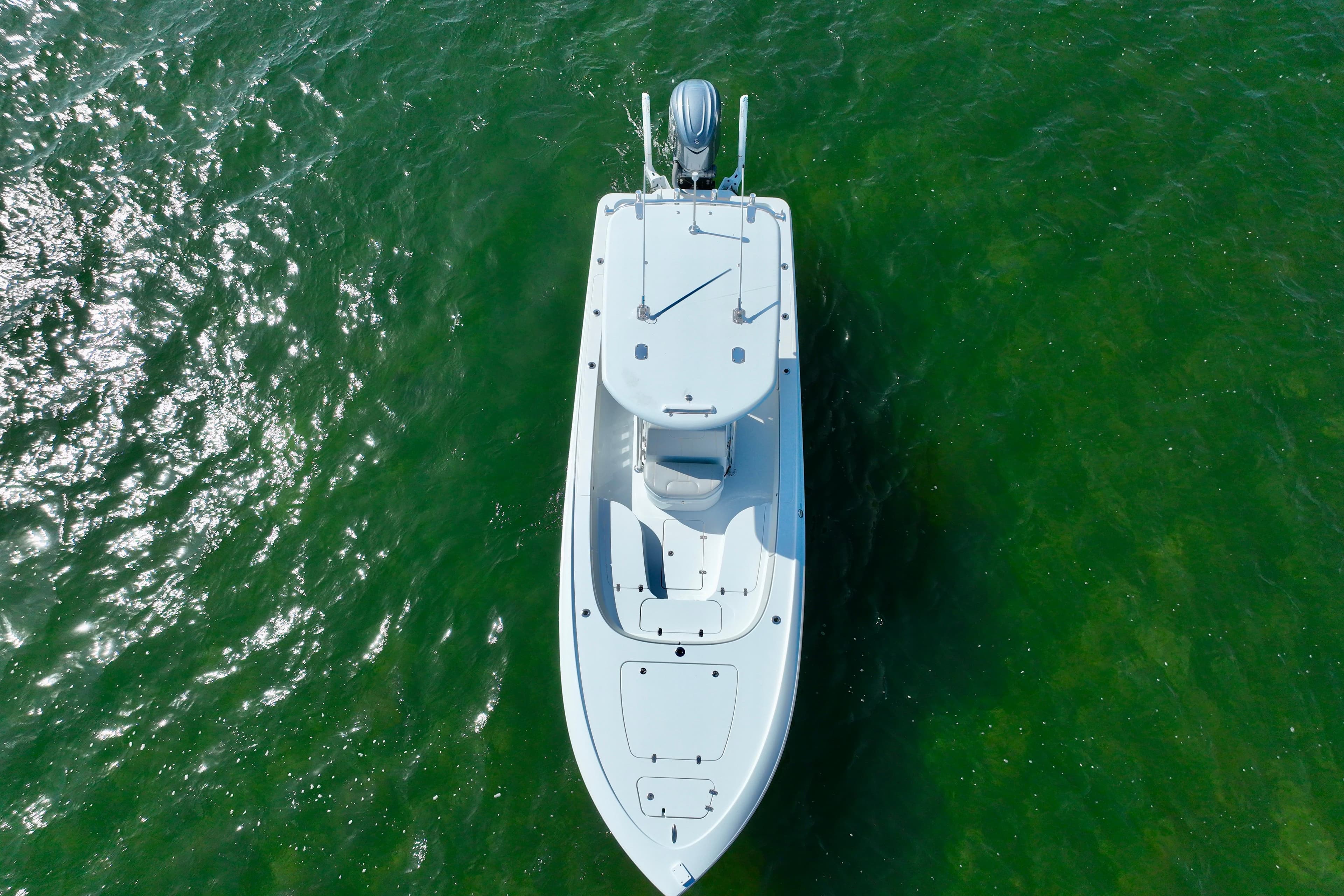 Aerial view of 2025 Contender 26 Bay boat on green water.