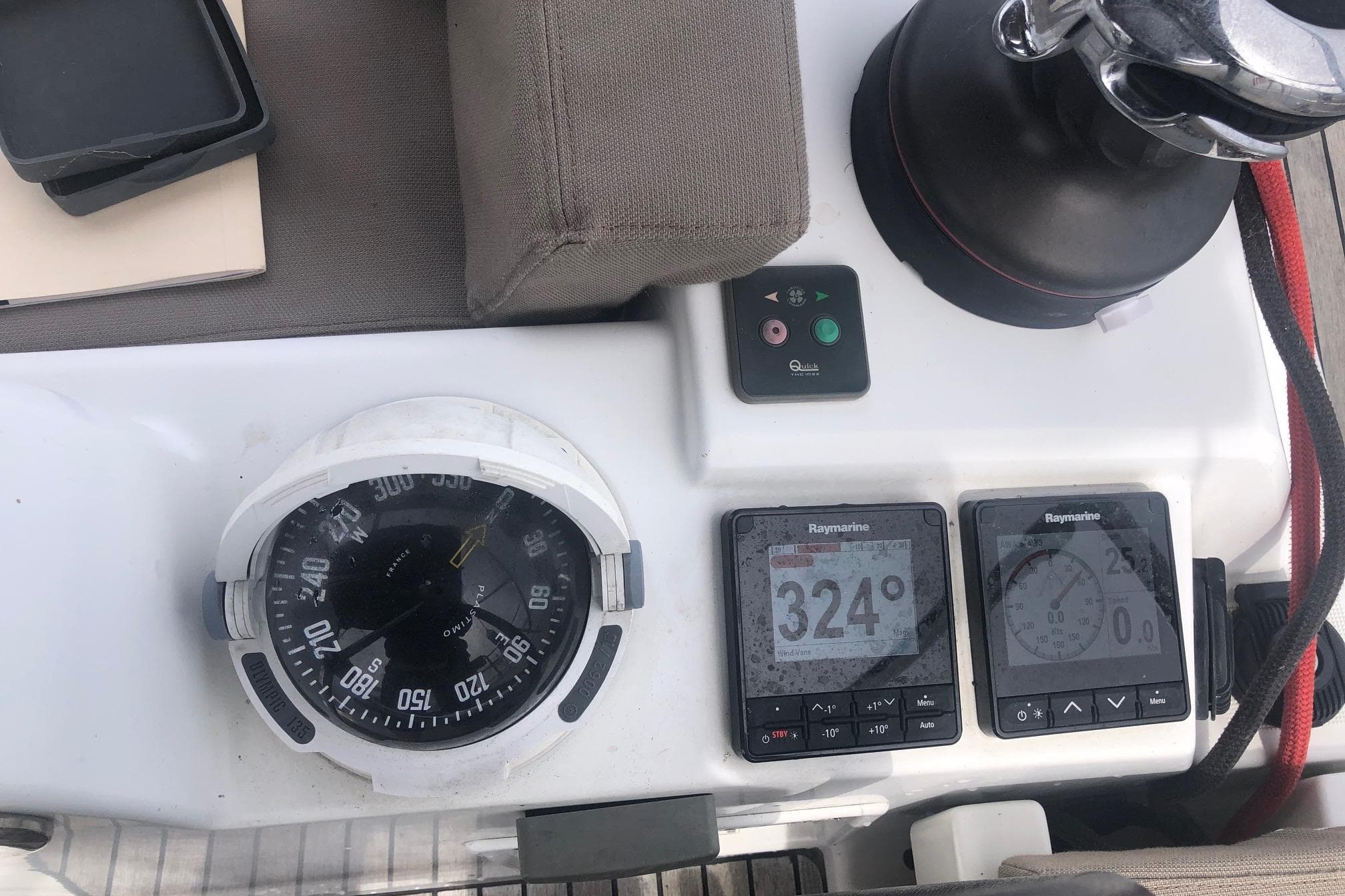 Cockpit instruments of 2017 Jeanneau Sun Odyssey 41 DS, featuring compass and Raymarine displays.