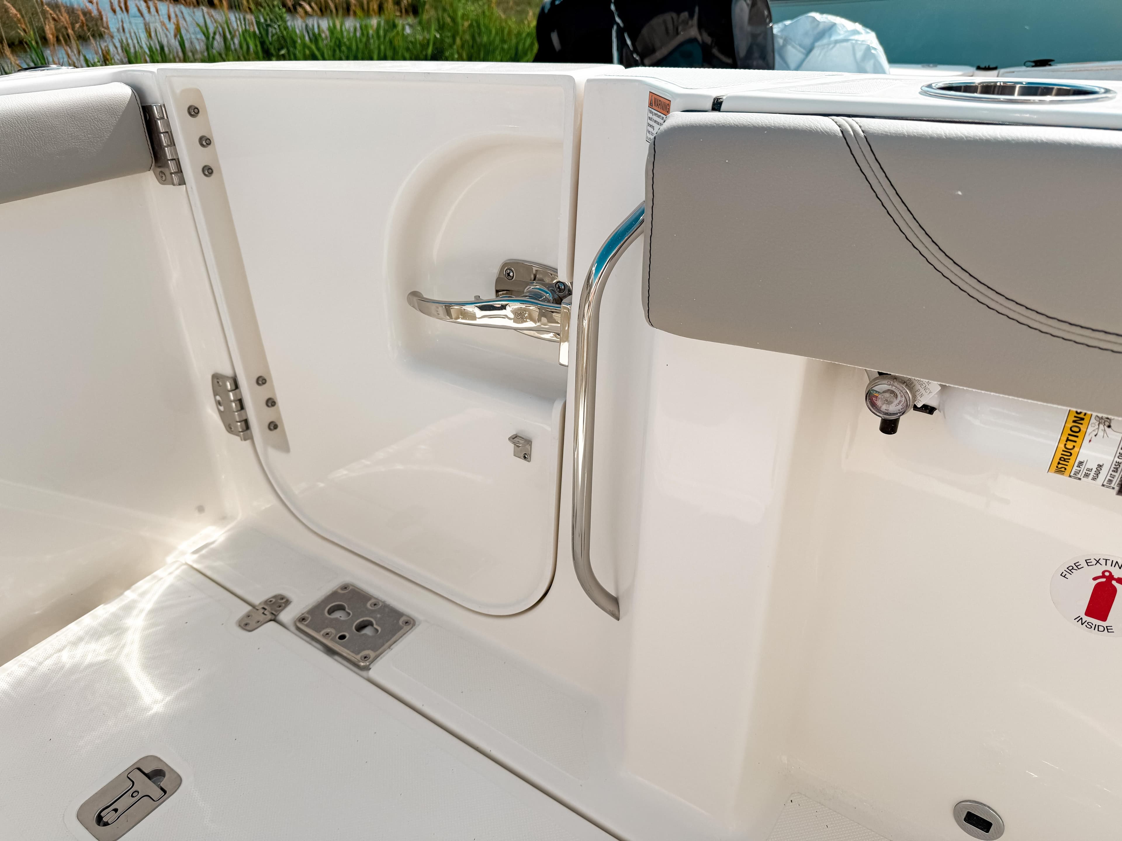 2025 Pursuit S 288 Sport boat interior with sleek white finish and modern fittings.
