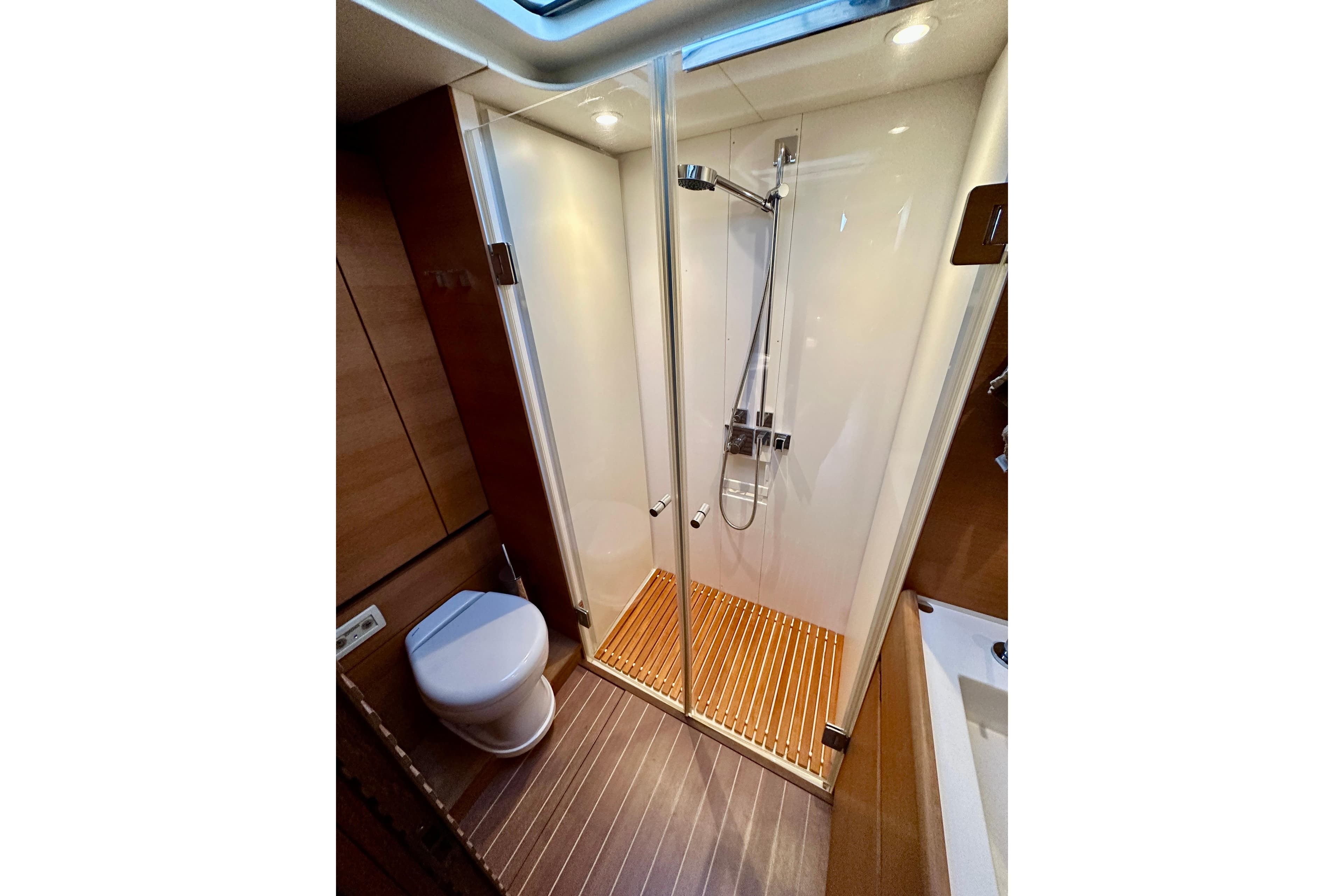 Luxurious bathroom in 2010 Nautor Swan 60 yacht with modern shower and toilet.