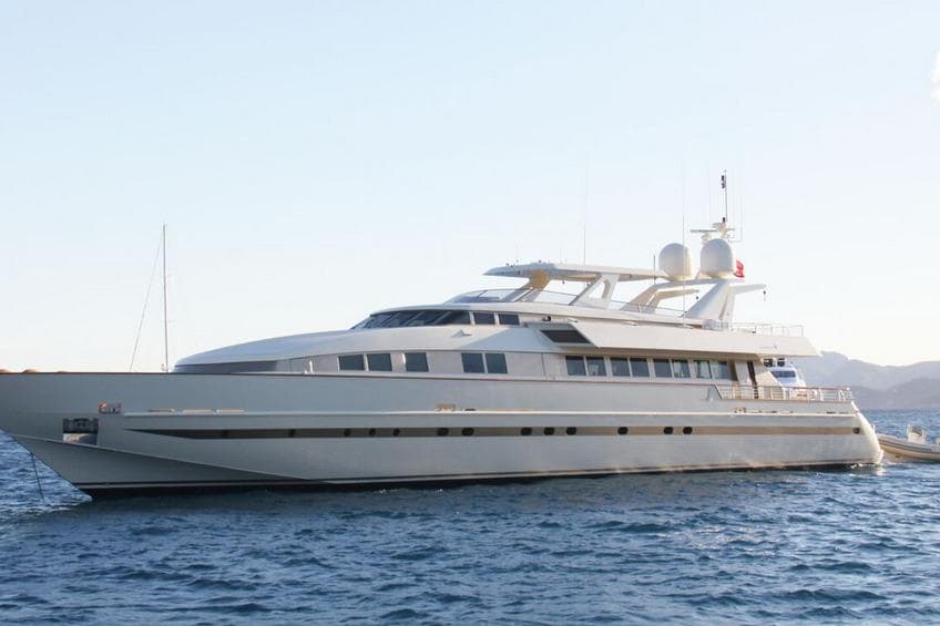 Luxury 1990 Baglietto RPH yacht cruising on open water.