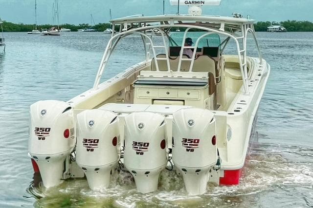 2011 Hydra-Sports 4200 SF boat with four 350 V8 engines on the water.
