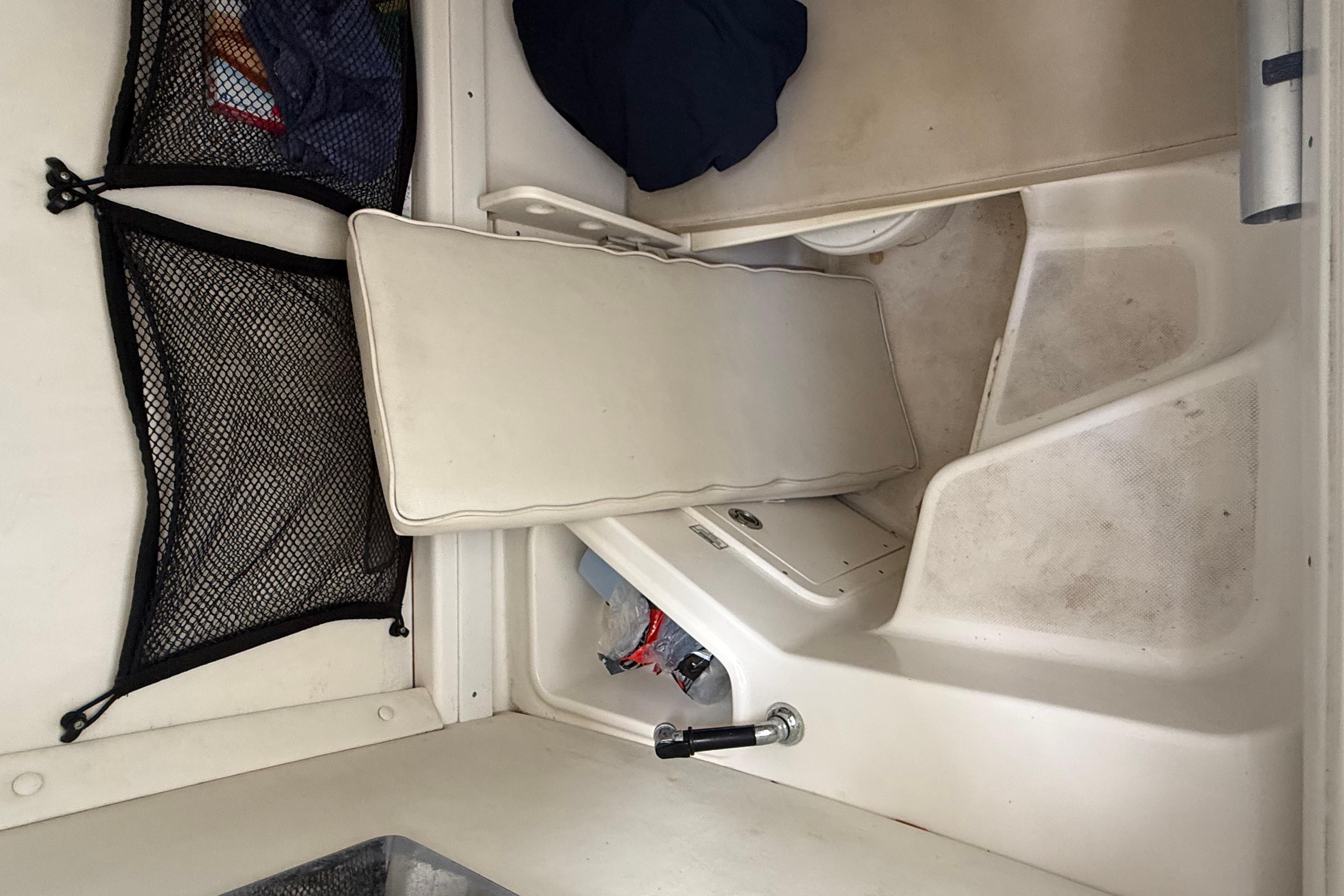 2008 Century 2901 Center Console interior with storage compartments and seating.