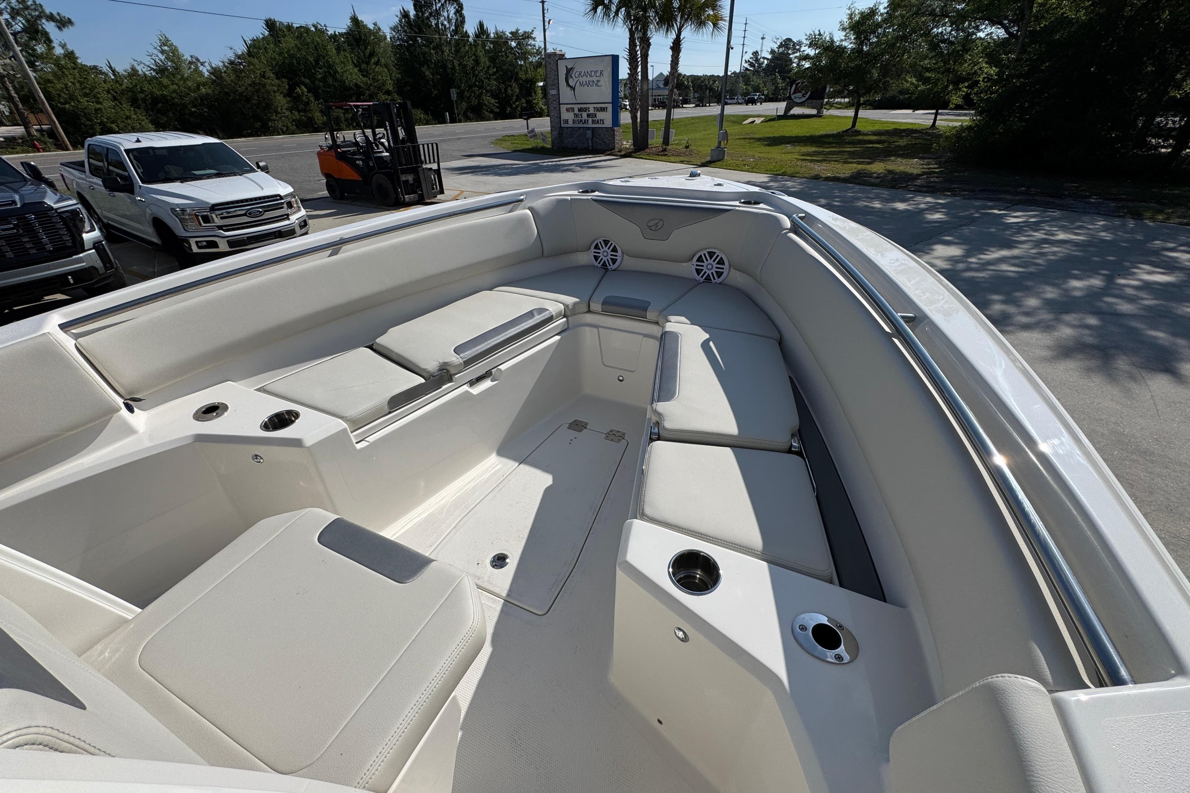 2026 Sailfish 232 CC boat interior with spacious seating and cup holders.