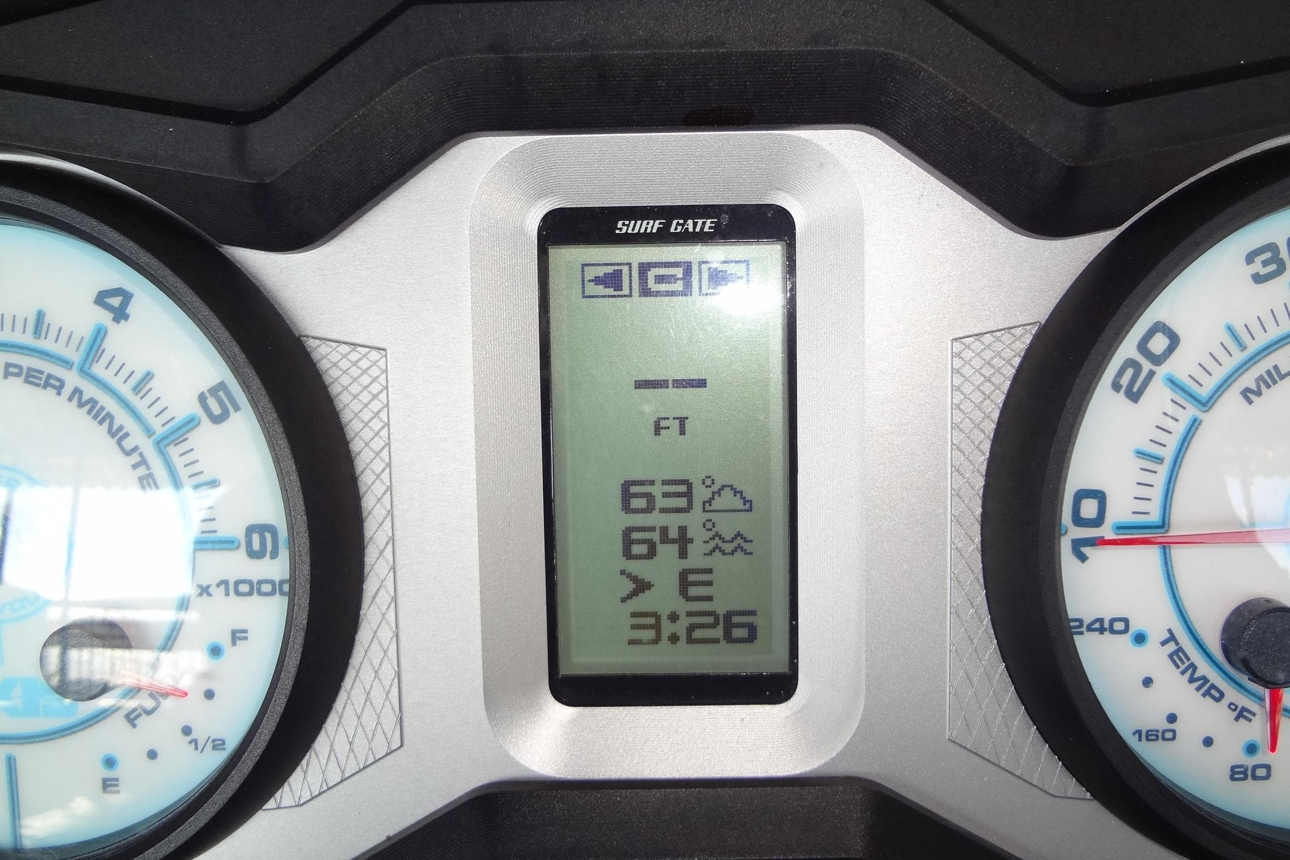 Dashboard of a 2021 Axis A24 boat showing speed, RPM, and weather information.
