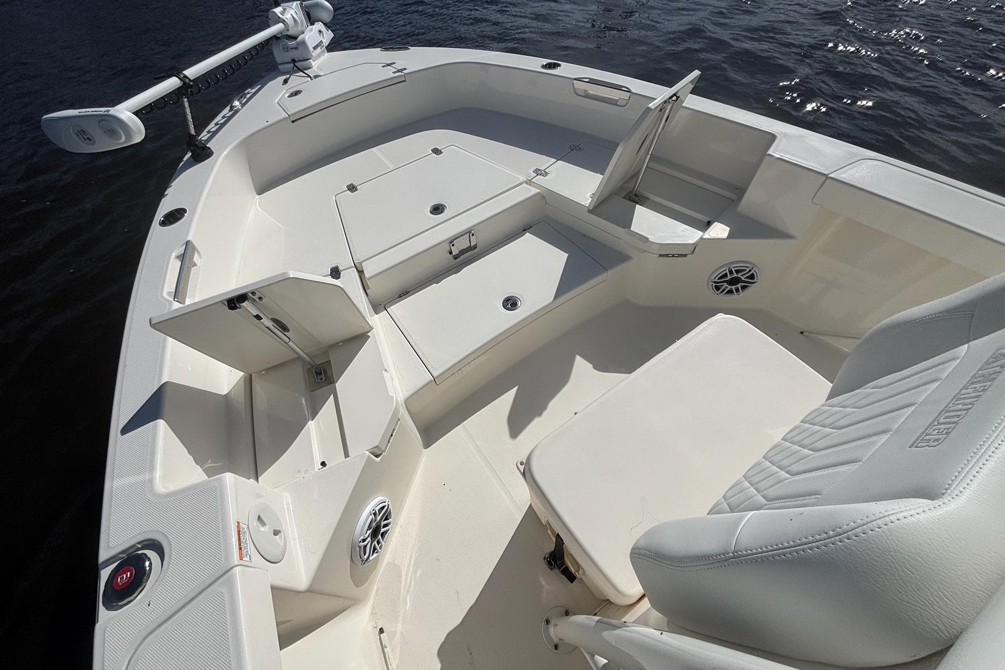 2023 Pathfinder 2400 TRS boat interior with seating and storage compartments.