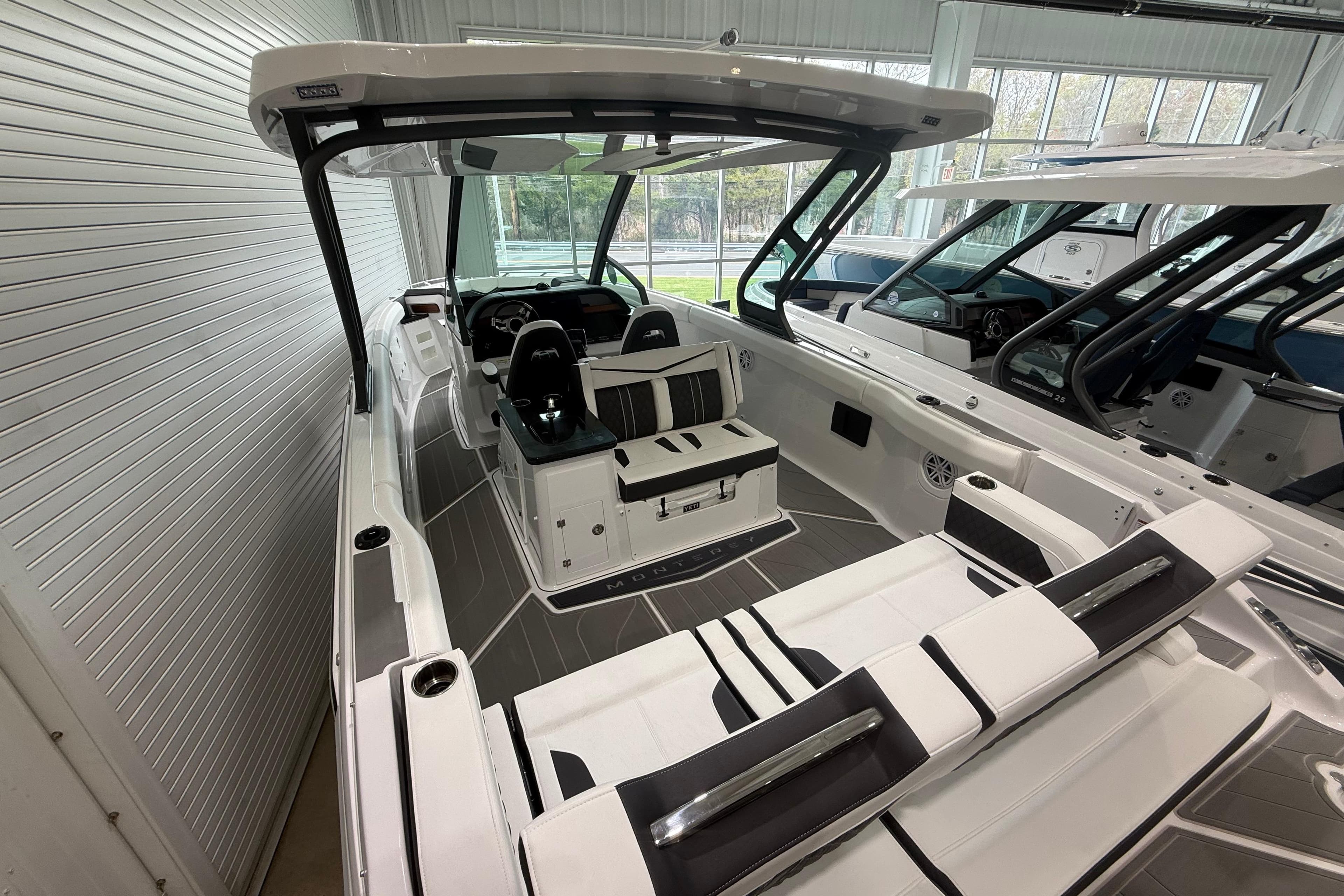 2026 Monterey Elite 30 OB boat interior with sleek seating and modern design.