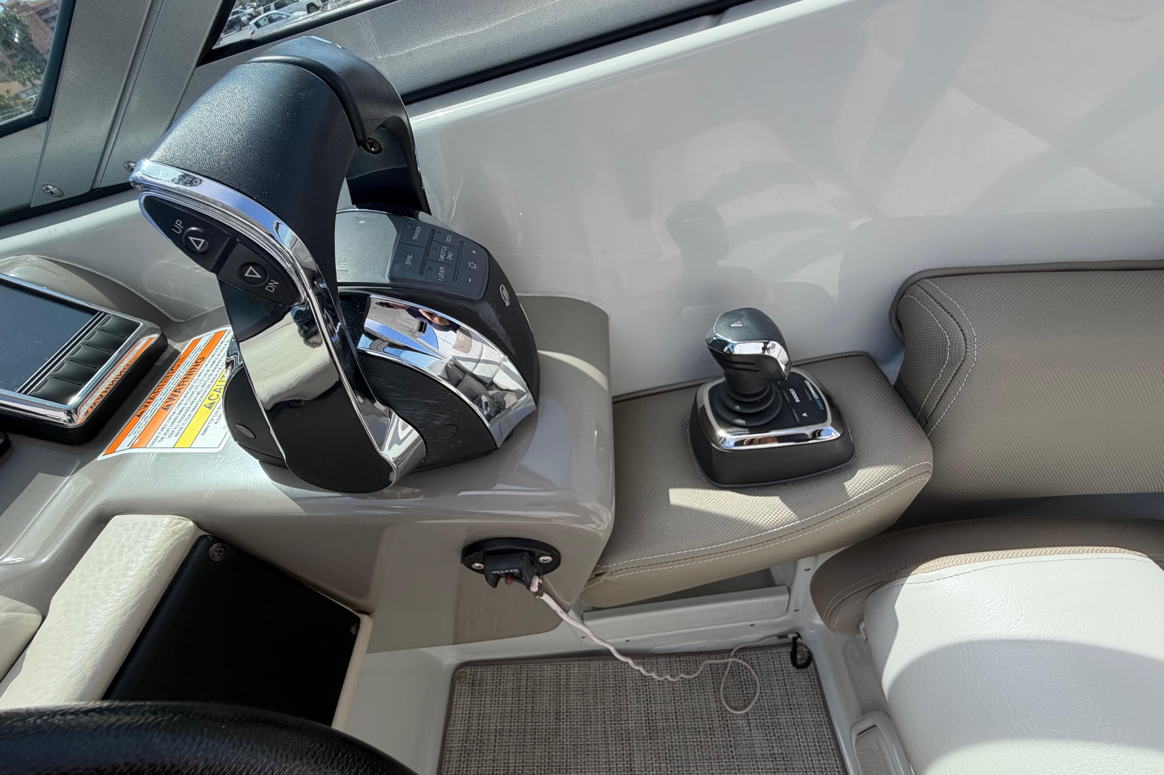 2019 Crownline Eclipse E295 XS boat controls with joystick and throttle lever.