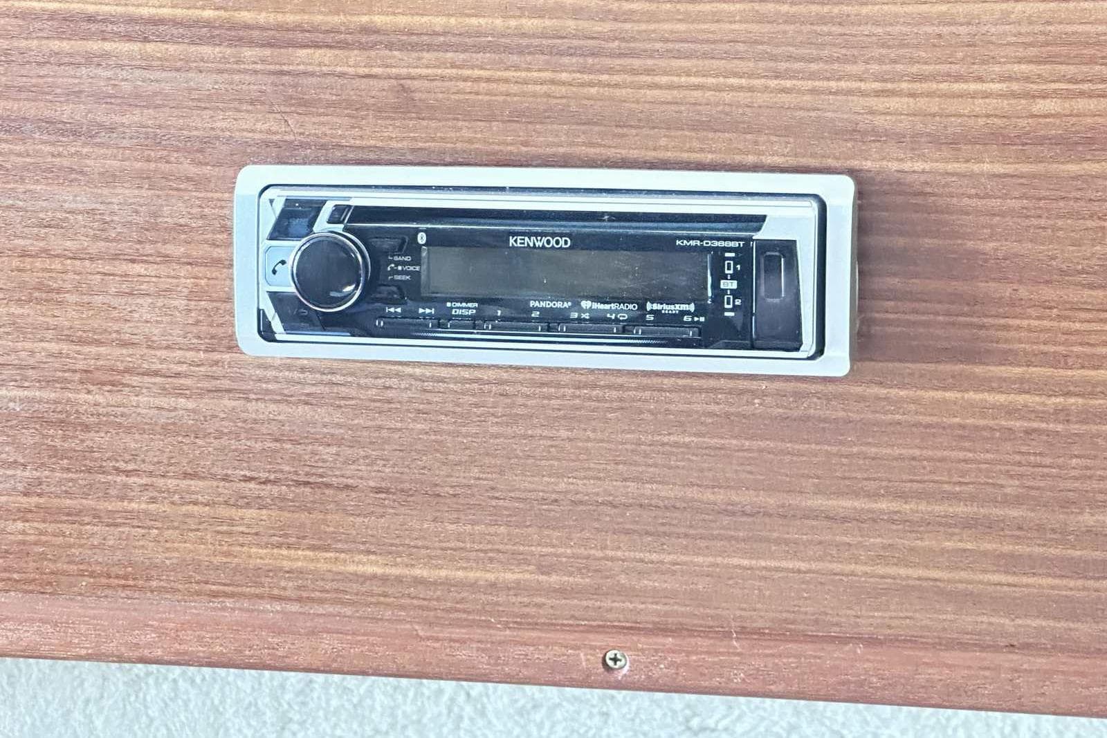 Kenwood stereo system on 1987 Sea Ray 340 Sundancer wooden panel.