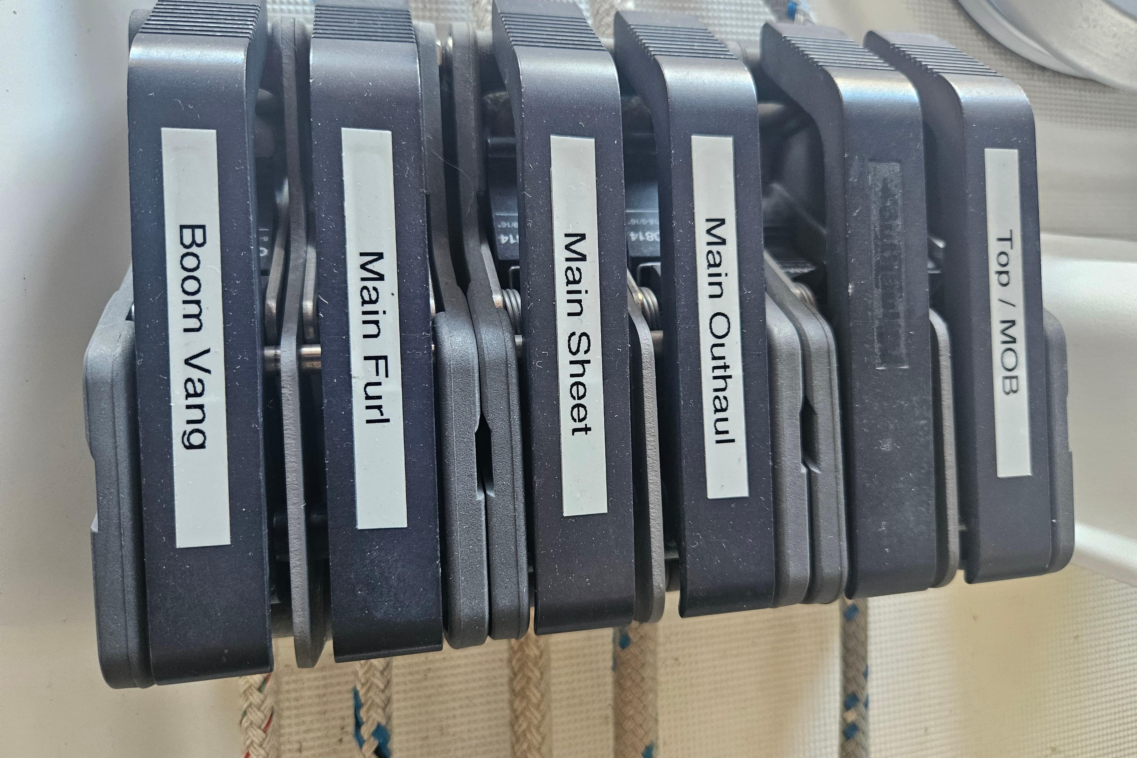 Sailing rope clutches labeled for a 1998 Beneteau 381 yacht.