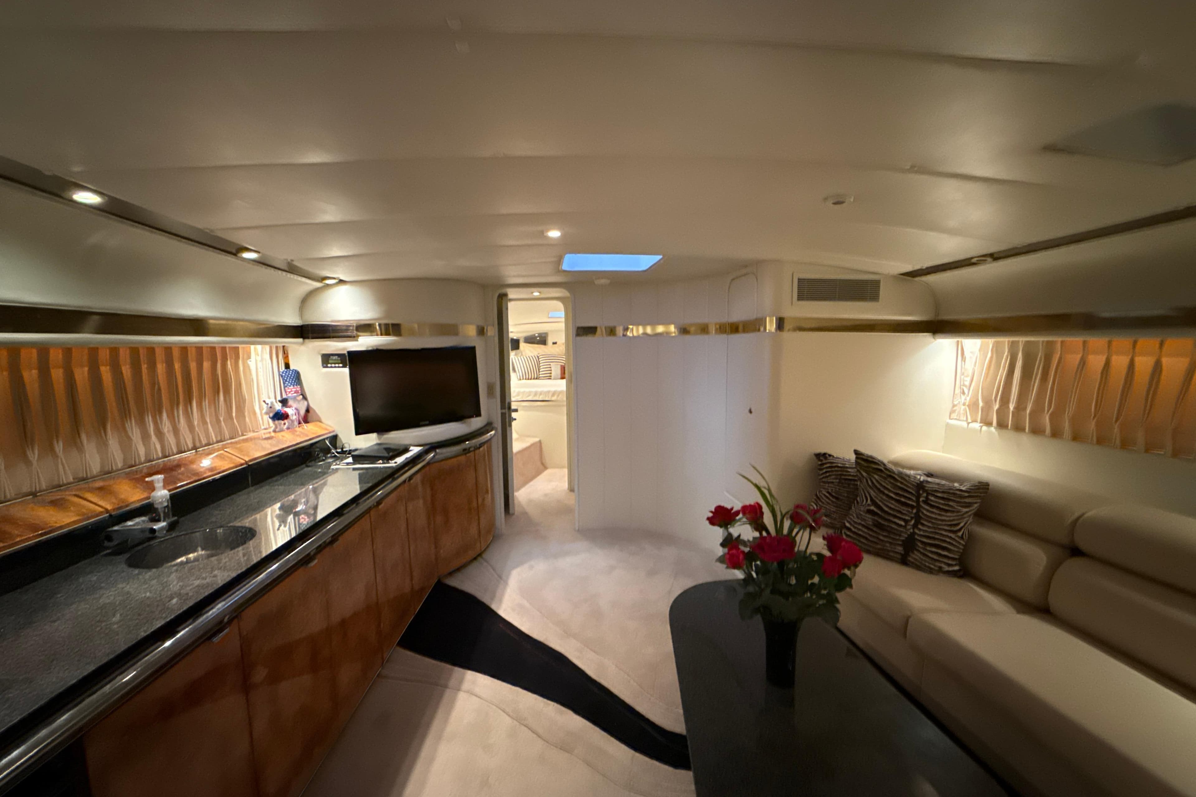 Luxurious interior of a 1999 Diaship 53 yacht with modern amenities.