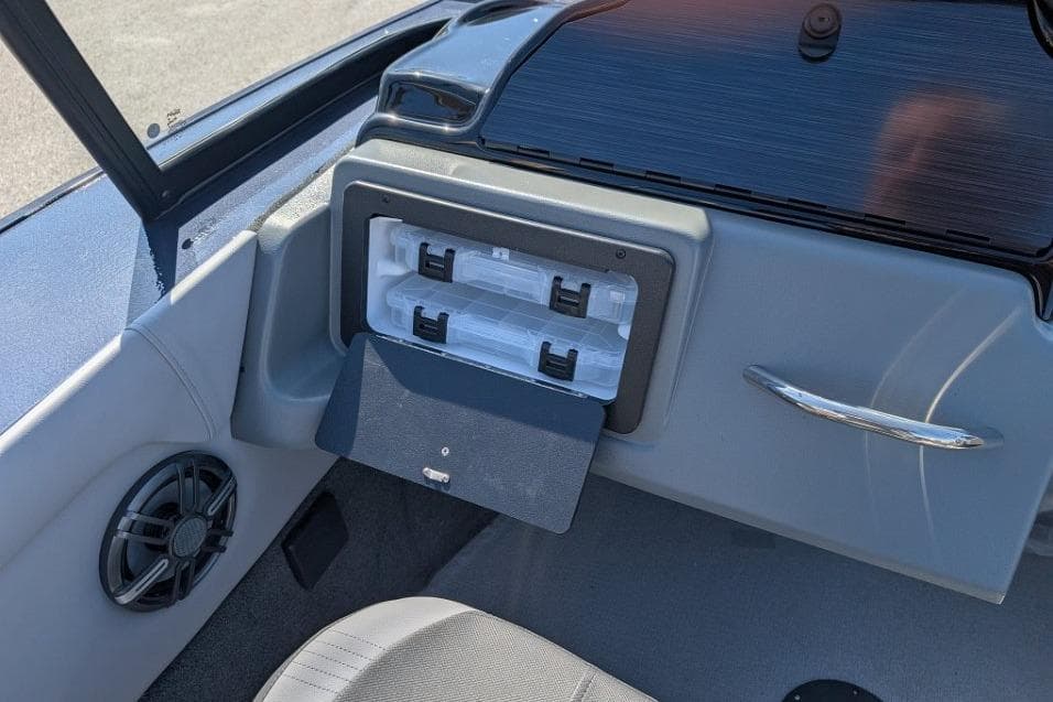 2026 Starcraft Superfisherman 186 boat interior with storage compartment and speaker.