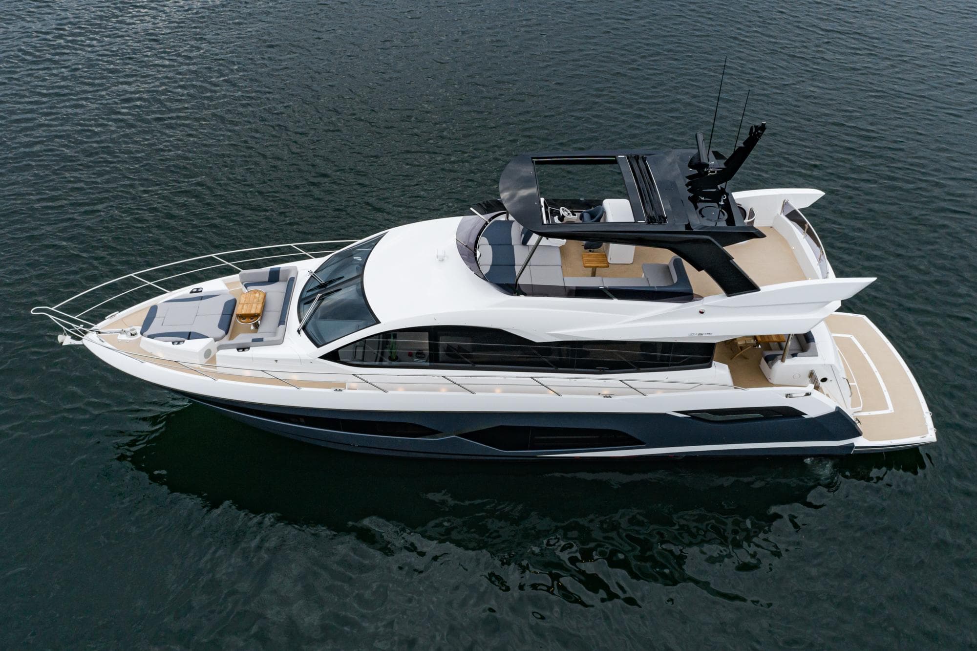 2023 Sunseeker Manhattan 68 luxury yacht on water.